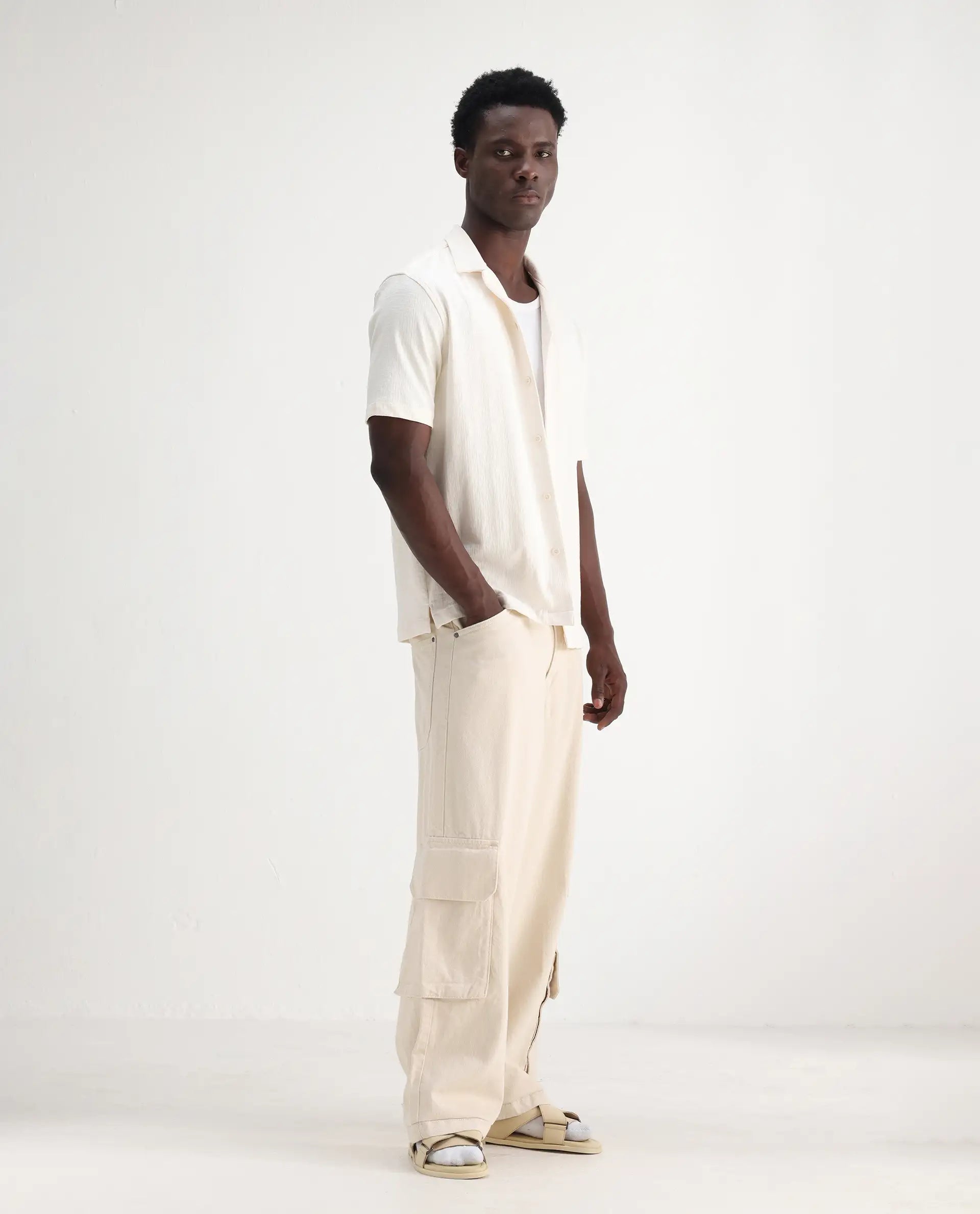 Rare Rabbit Men's Freks Beige Cotton Plain Baggy Fit Jeans