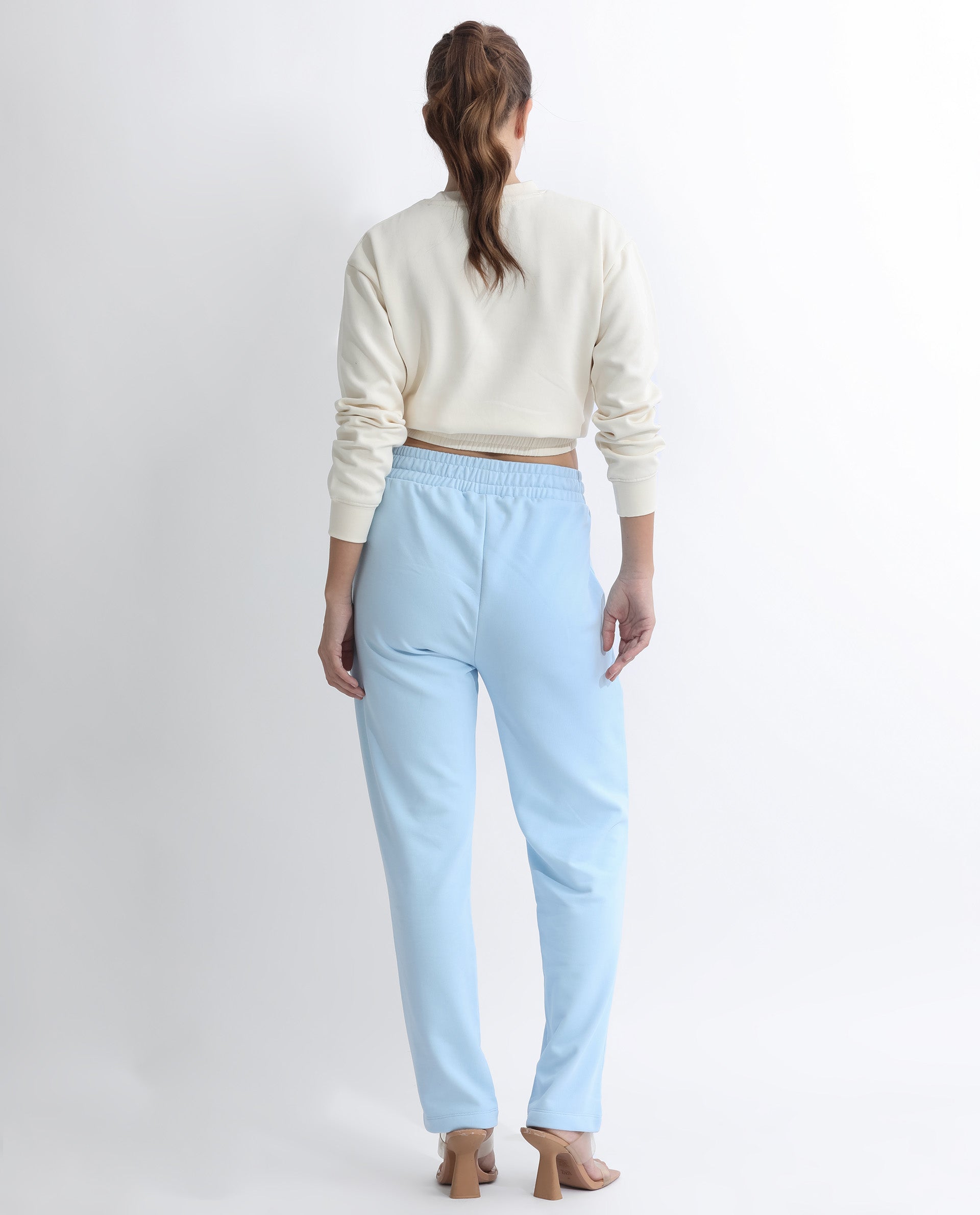 Rareism Women Fronk Light Blue Poly Cotton Fabric Tailored Fit Solid Mid Rise Ankle Length Track Pant