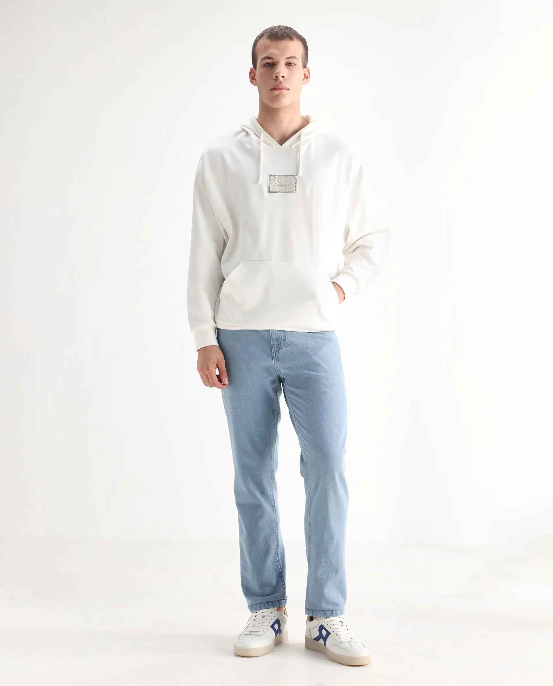 Rare Rabbit Men's Gleb Light Blue Cotton Plain Kurt Carrot Fit Jeans