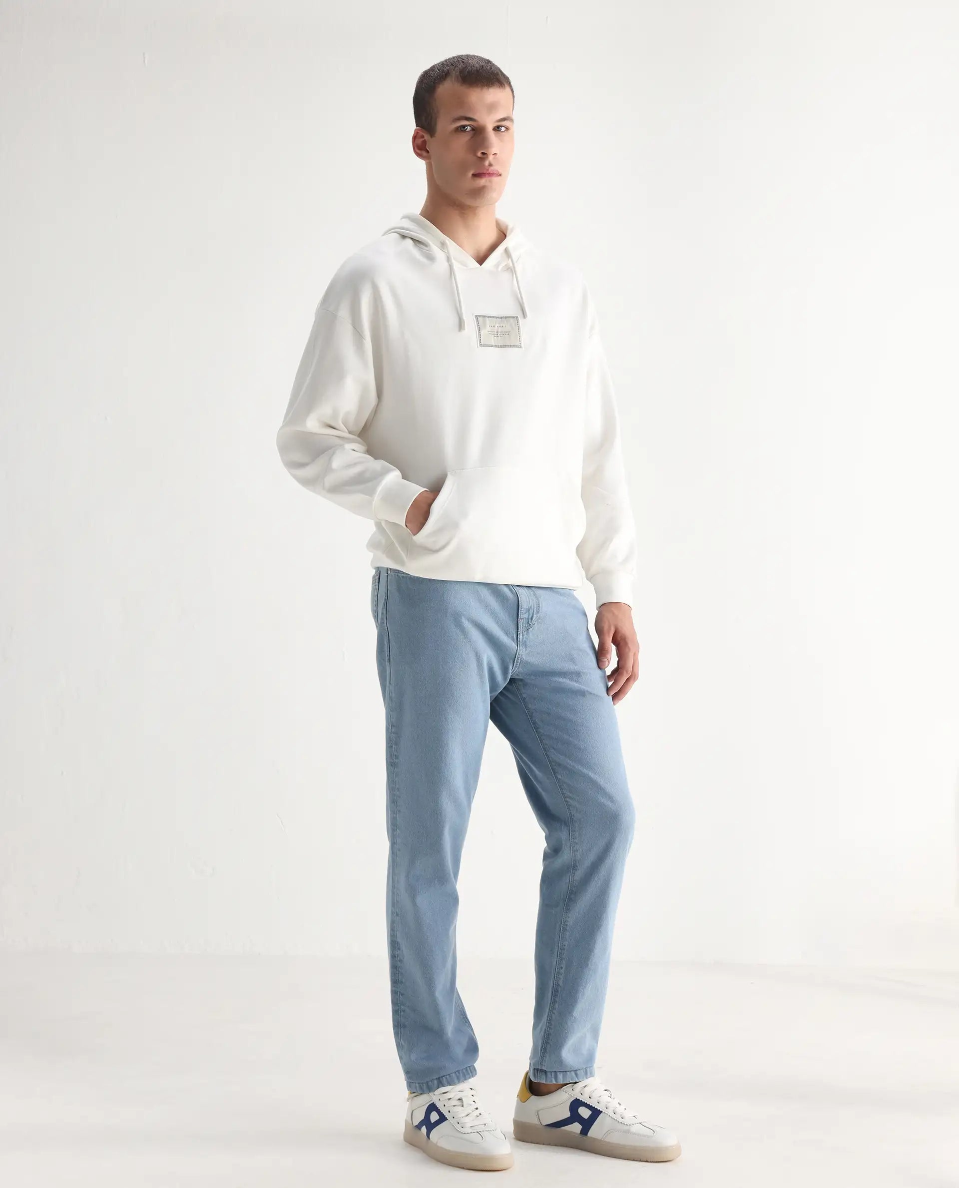 Rare Rabbit Men's Gleb Light Blue Cotton Plain Kurt Carrot Fit Jeans