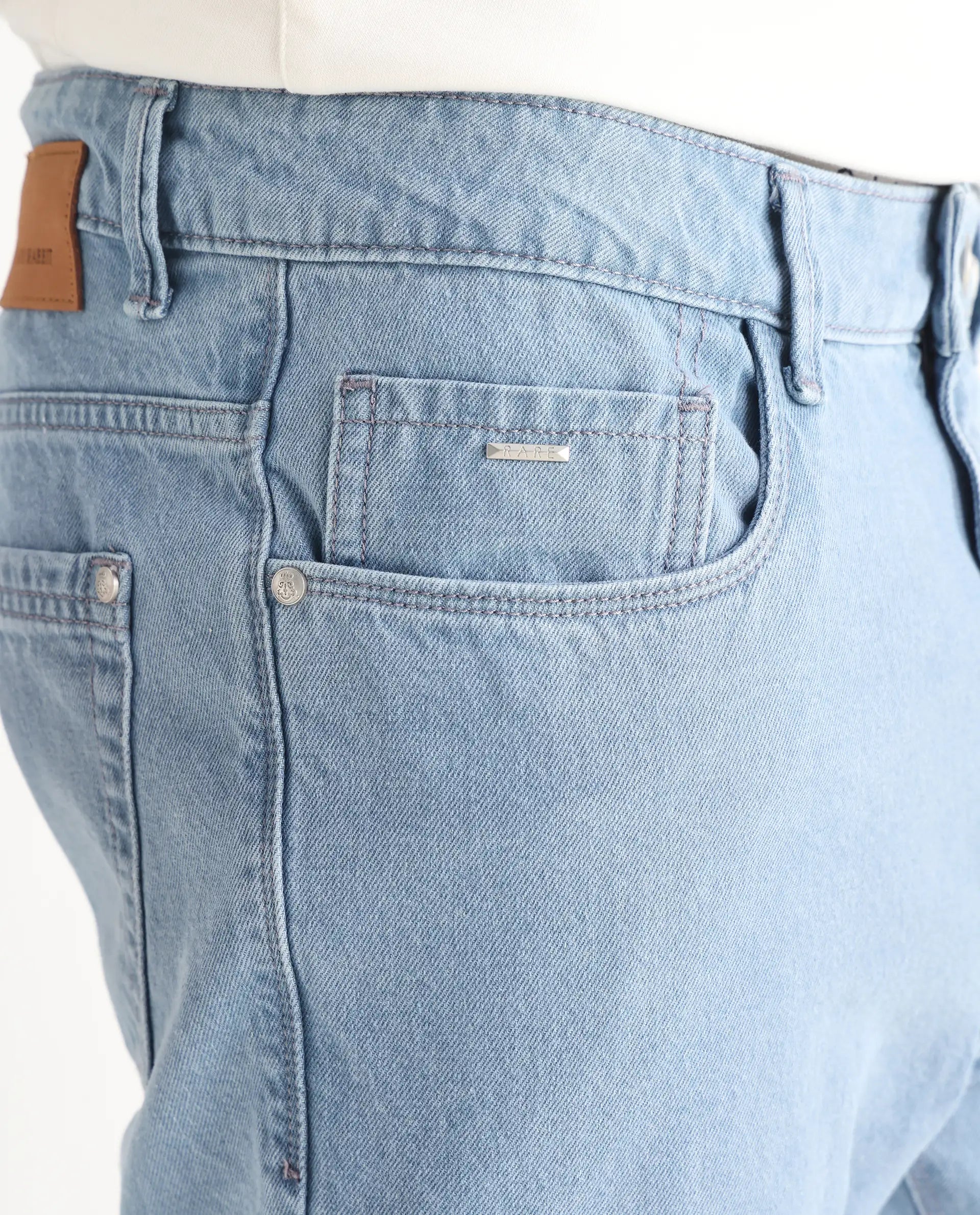 Rare Rabbit Men's Gleb Light Blue Cotton Plain Kurt Carrot Fit Jeans