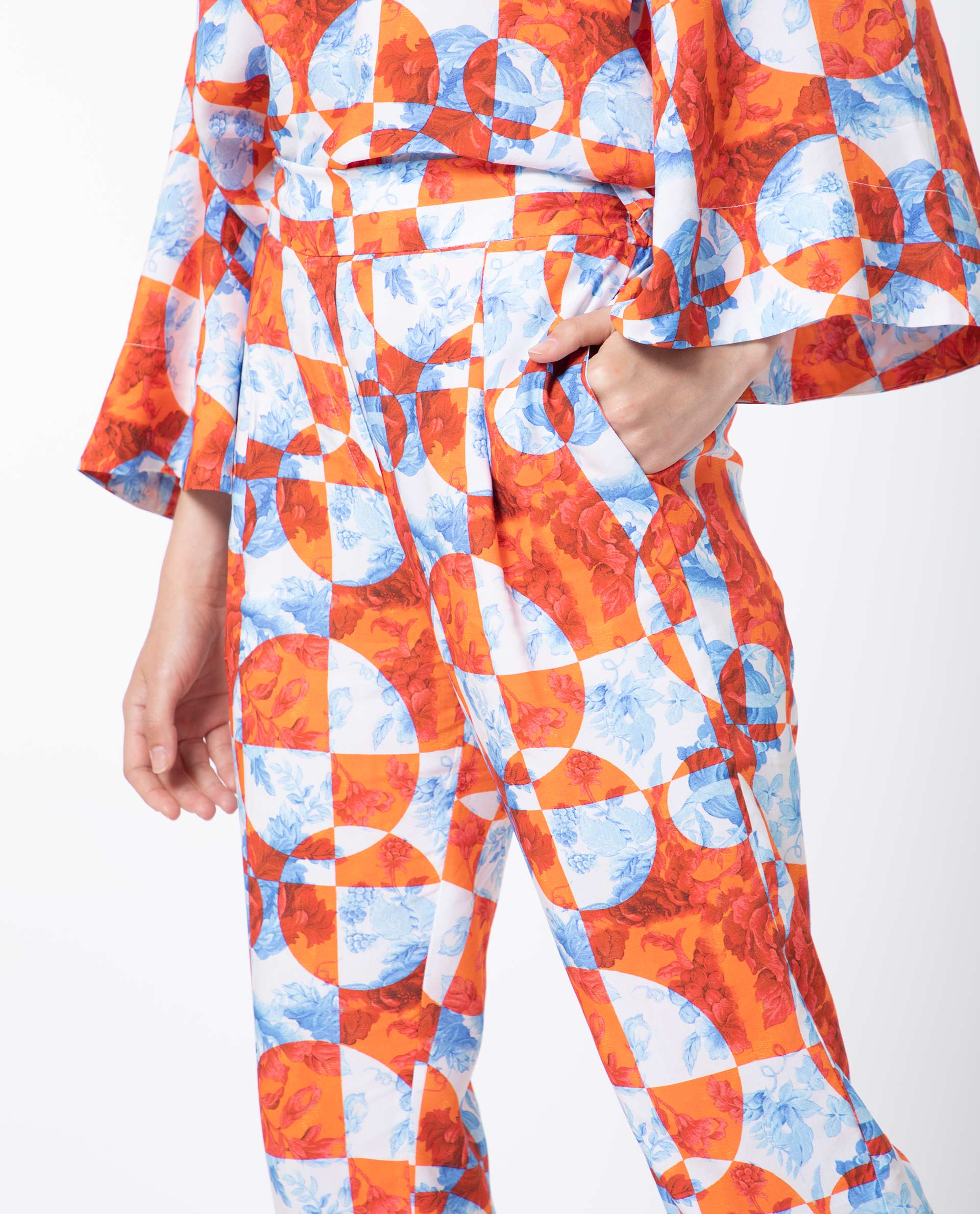 Rareism Women Gray Orange Viscose Fabric Drawstring Closure Regular Fit Floral Print Ankle Length Trousers