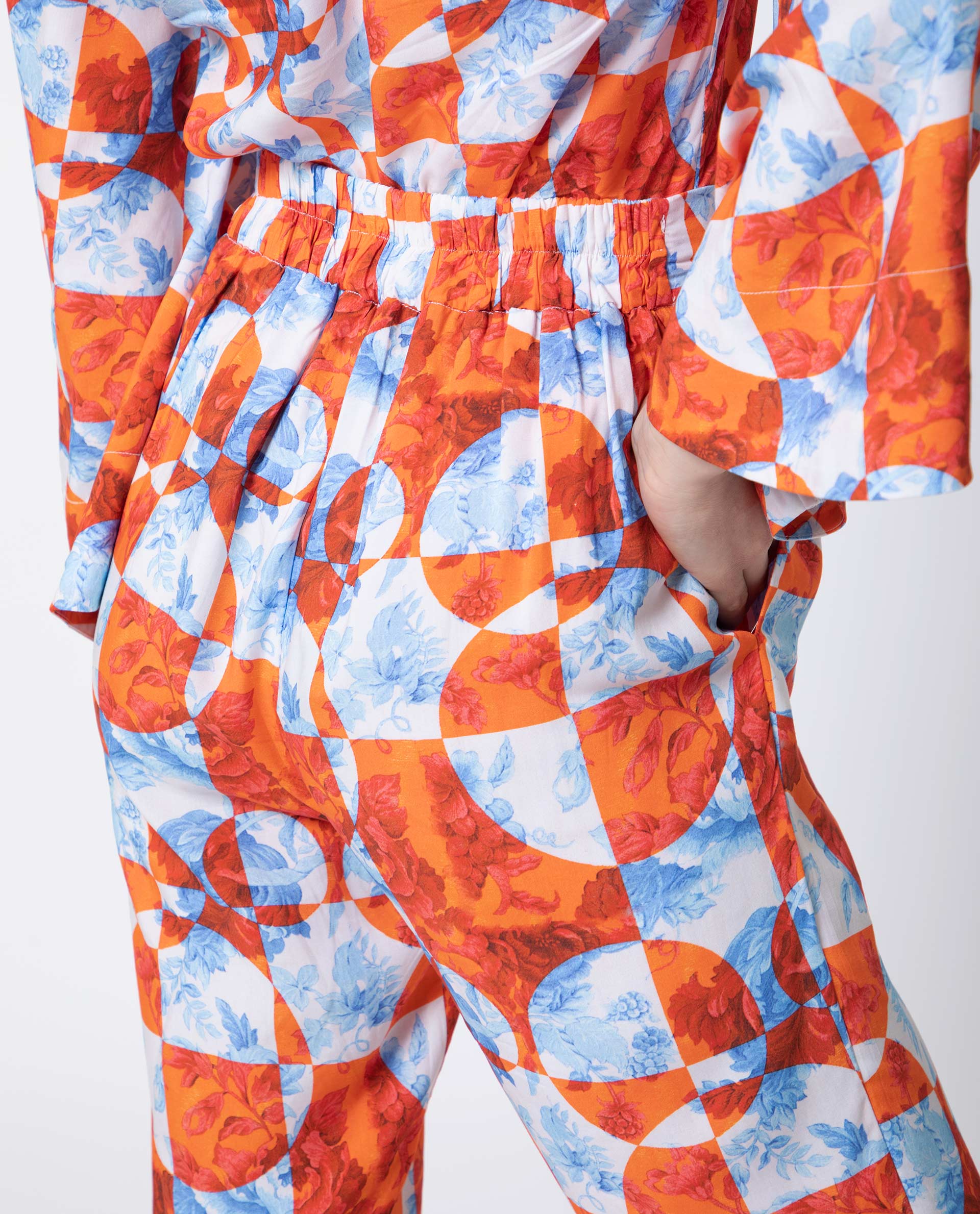 Rareism Women Gray Orange Viscose Fabric Drawstring Closure Regular Fit Floral Print Ankle Length Trousers