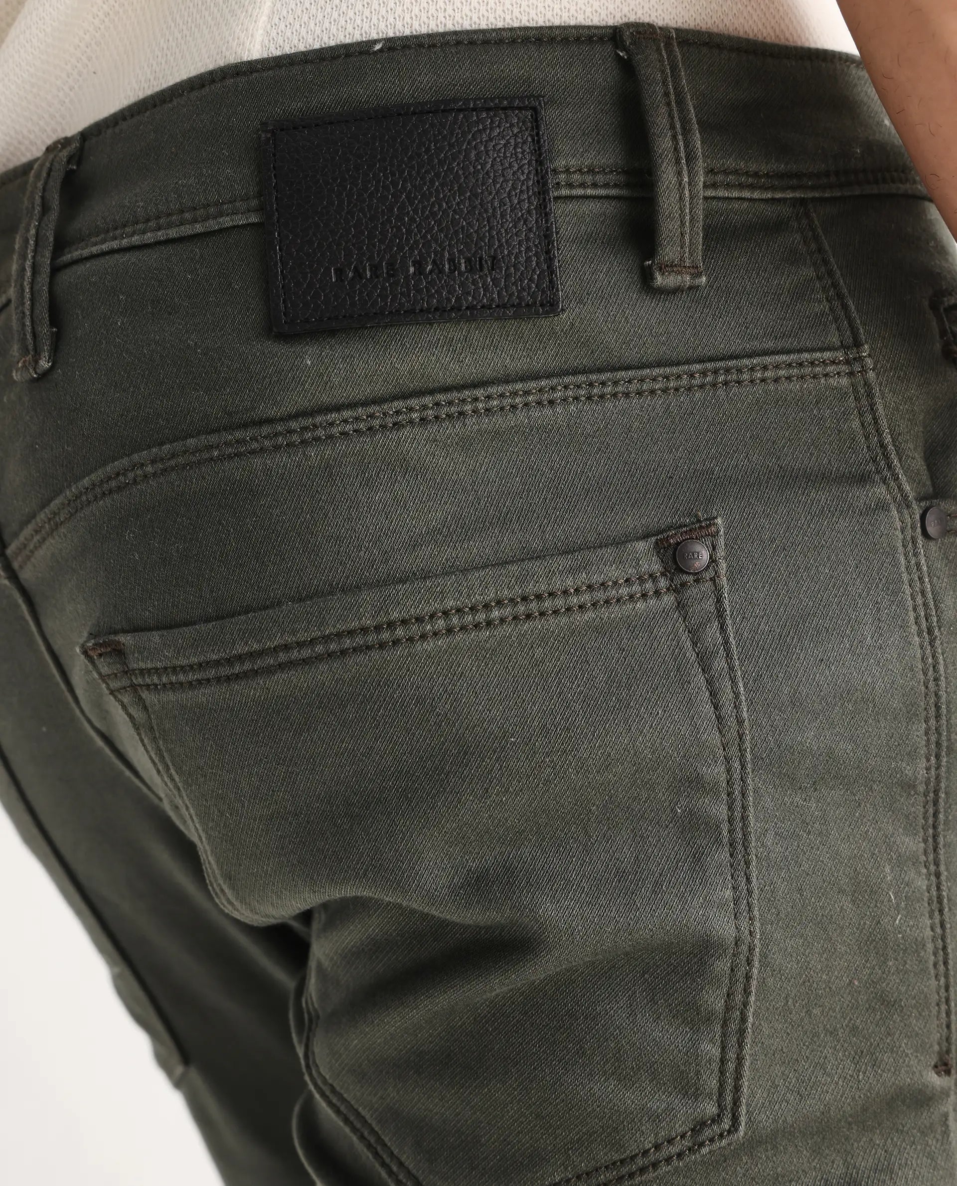 Rare Rabbit Men's Hede Olive Cotton Plain Hawk Slim Fit Jeans