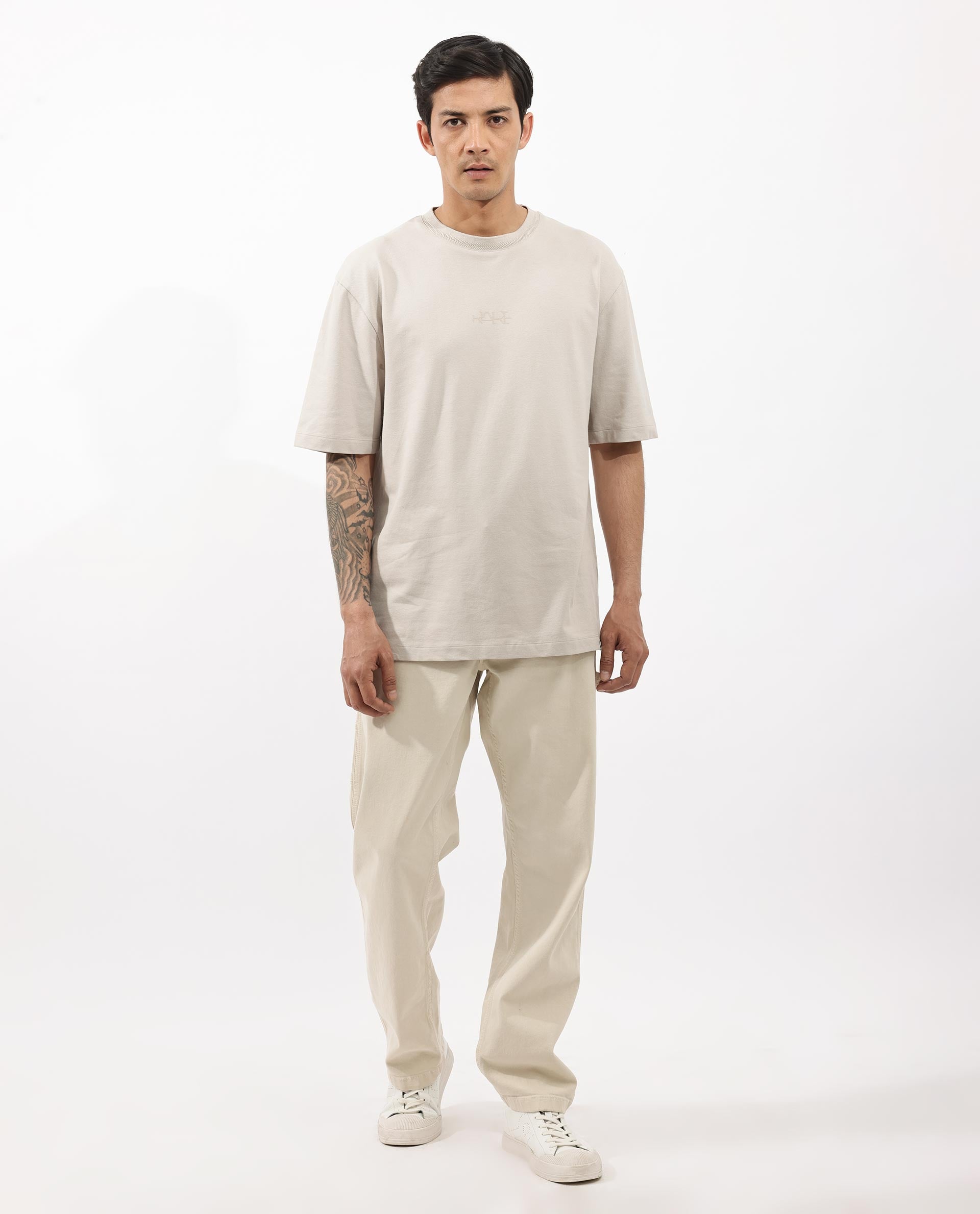 Rare Rabbit Mens Heros Beige Cotton Lycra Fabric Blend Drop Shoulder Short Sleeve Oversized Fit Solid T-Shirt