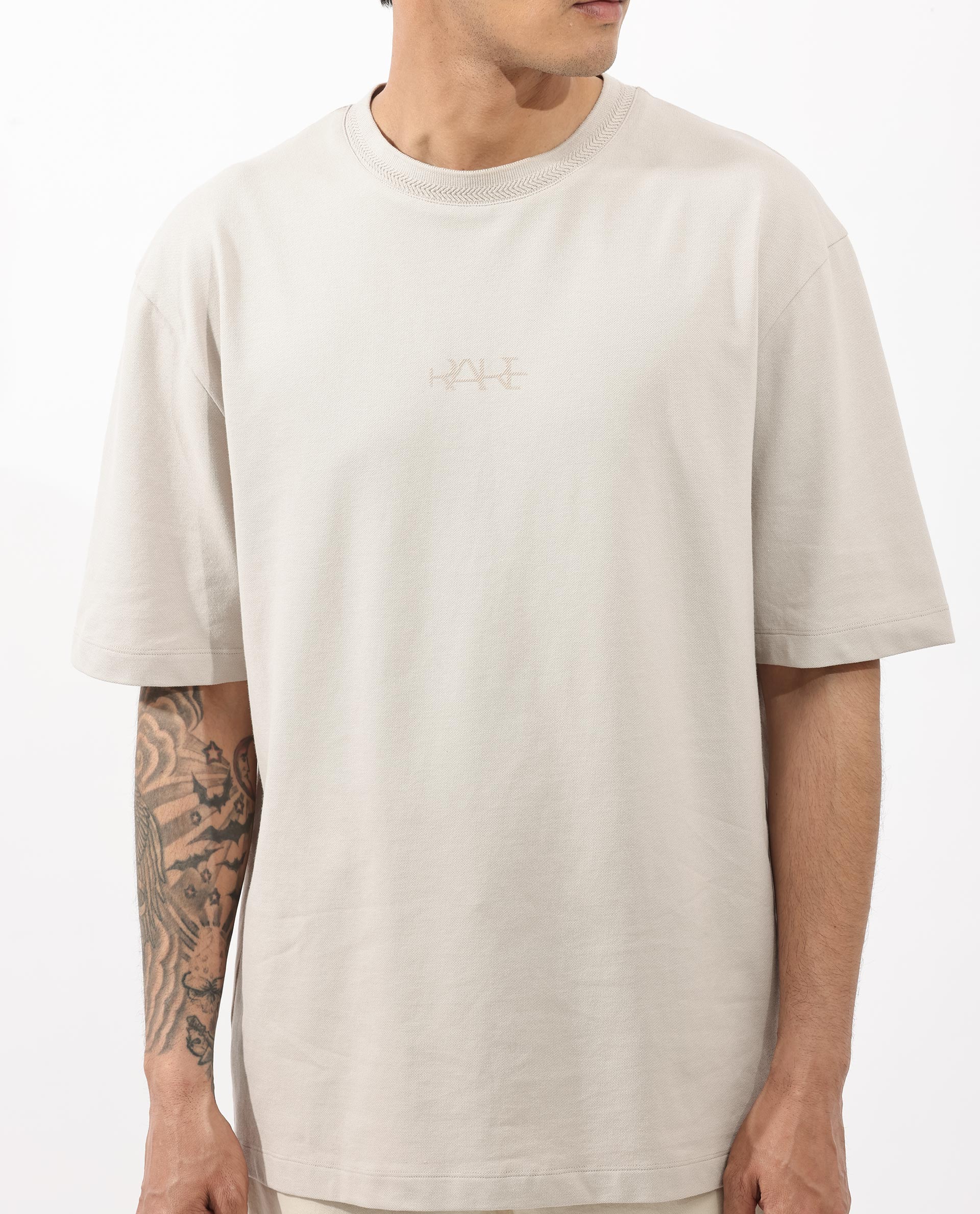 Rare Rabbit Mens Heros Beige Cotton Lycra Fabric Blend Drop Shoulder Short Sleeve Oversized Fit Solid T-Shirt