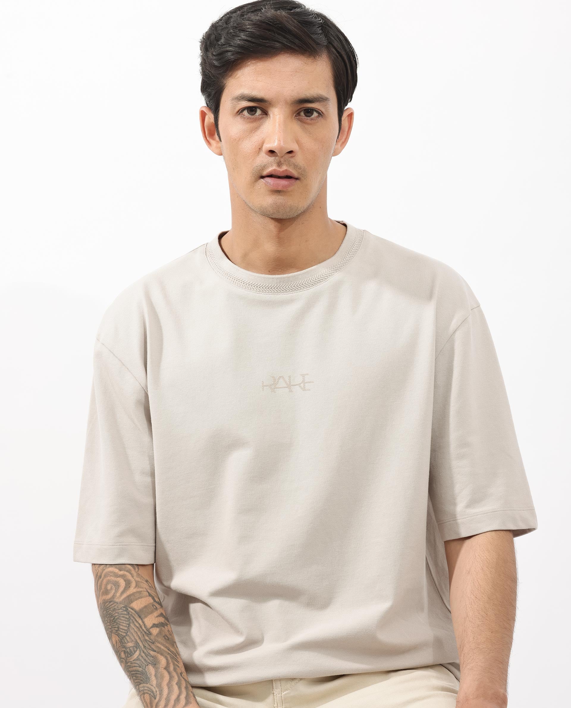 Rare Rabbit Mens Heros Beige Cotton Lycra Fabric Blend Drop Shoulder Short Sleeve Oversized Fit Solid T-Shirt