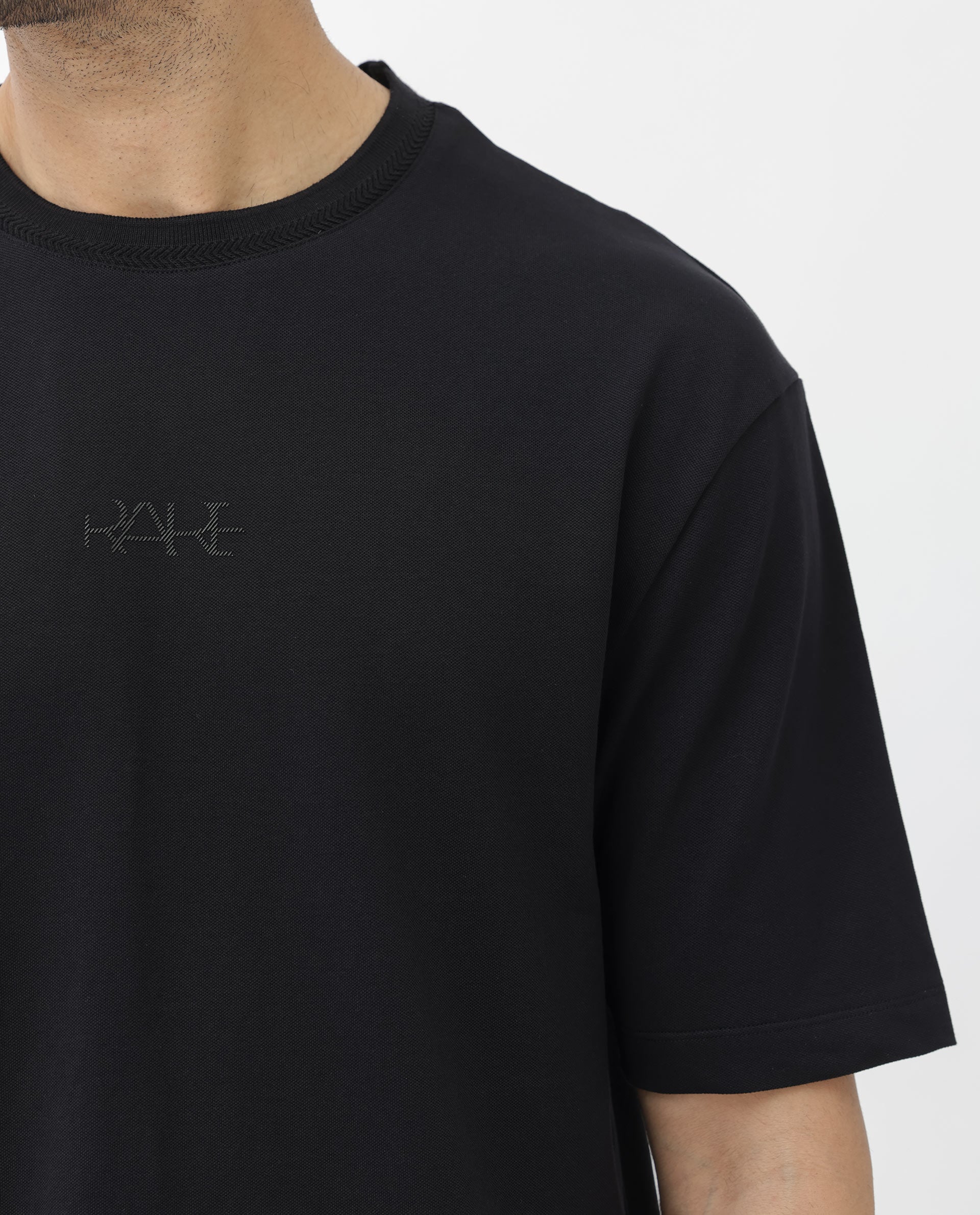 Rare Rabbit Mens Heros Black Cotton Lycra Fabric Blend Drop Shoulder Short Sleeve Oversized Fit Solid T-Shirt