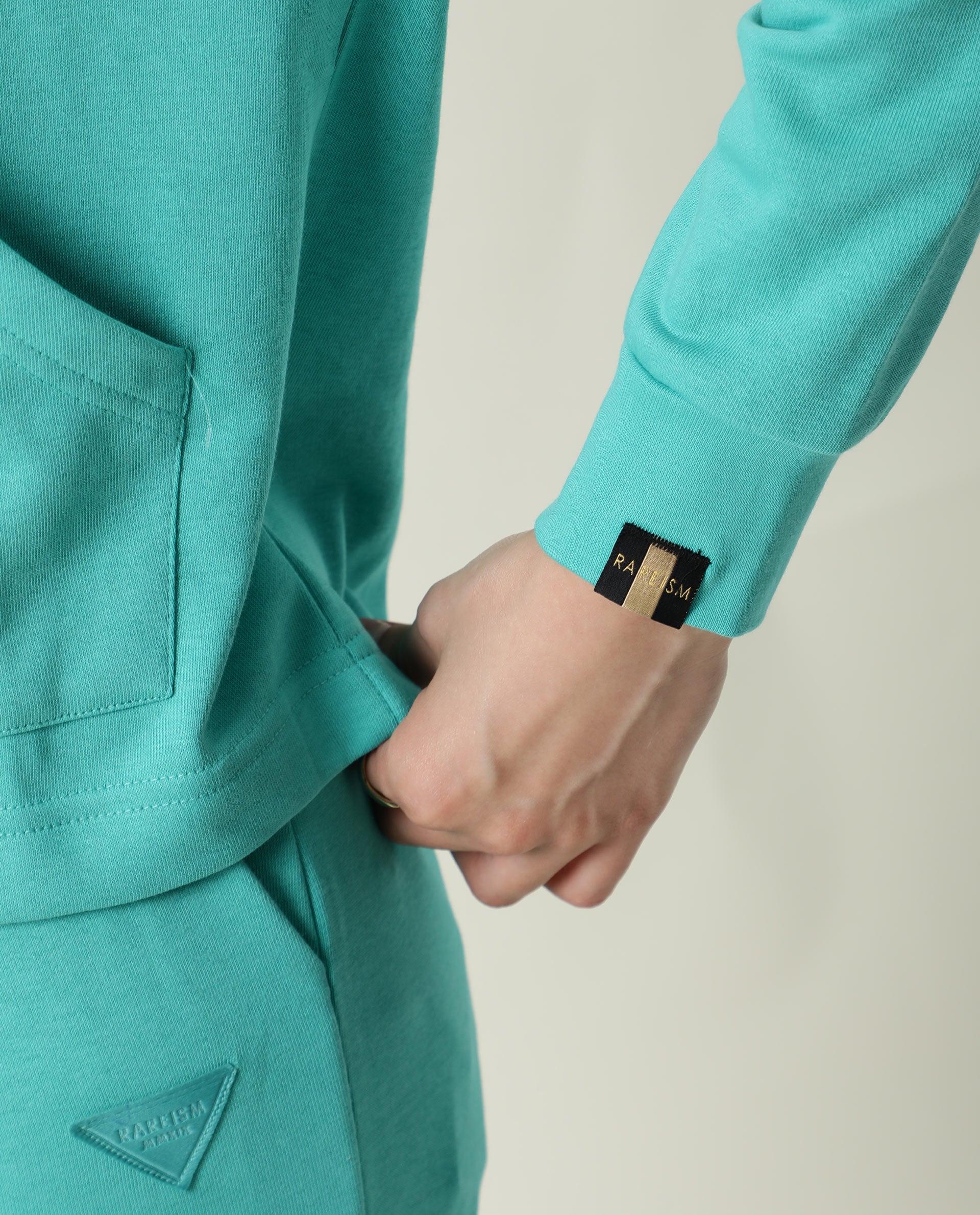 Rareism Women Wally-1 Turq Cotton Poly Fabric Relaxed Fit Full Sleeves Solid Hooded Sweatshirt