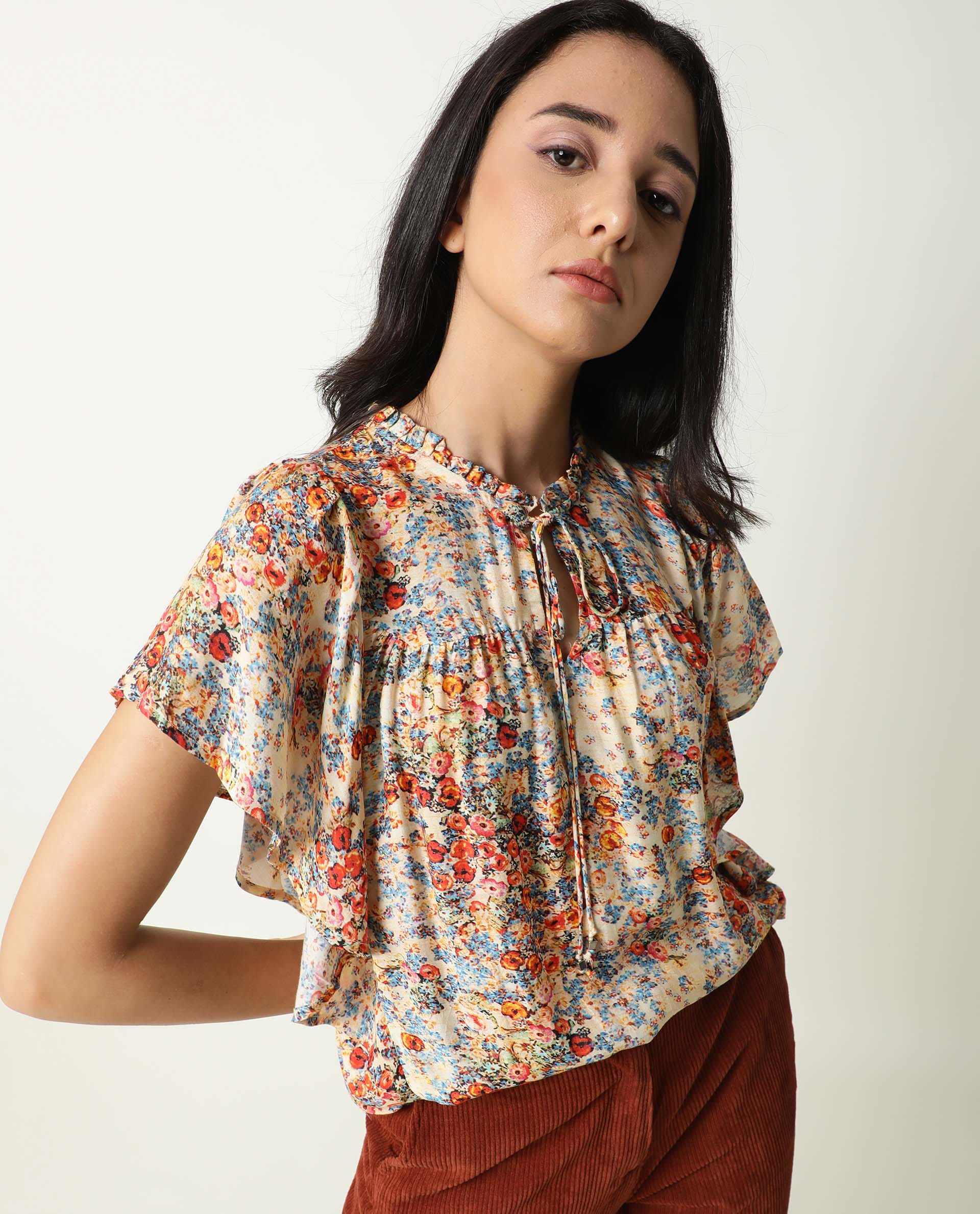 Rareism Women Nigel Off White Cotton Silk Fabric Relaxed Fit Tie-Up Neck Half Sleeves Floral Print Top