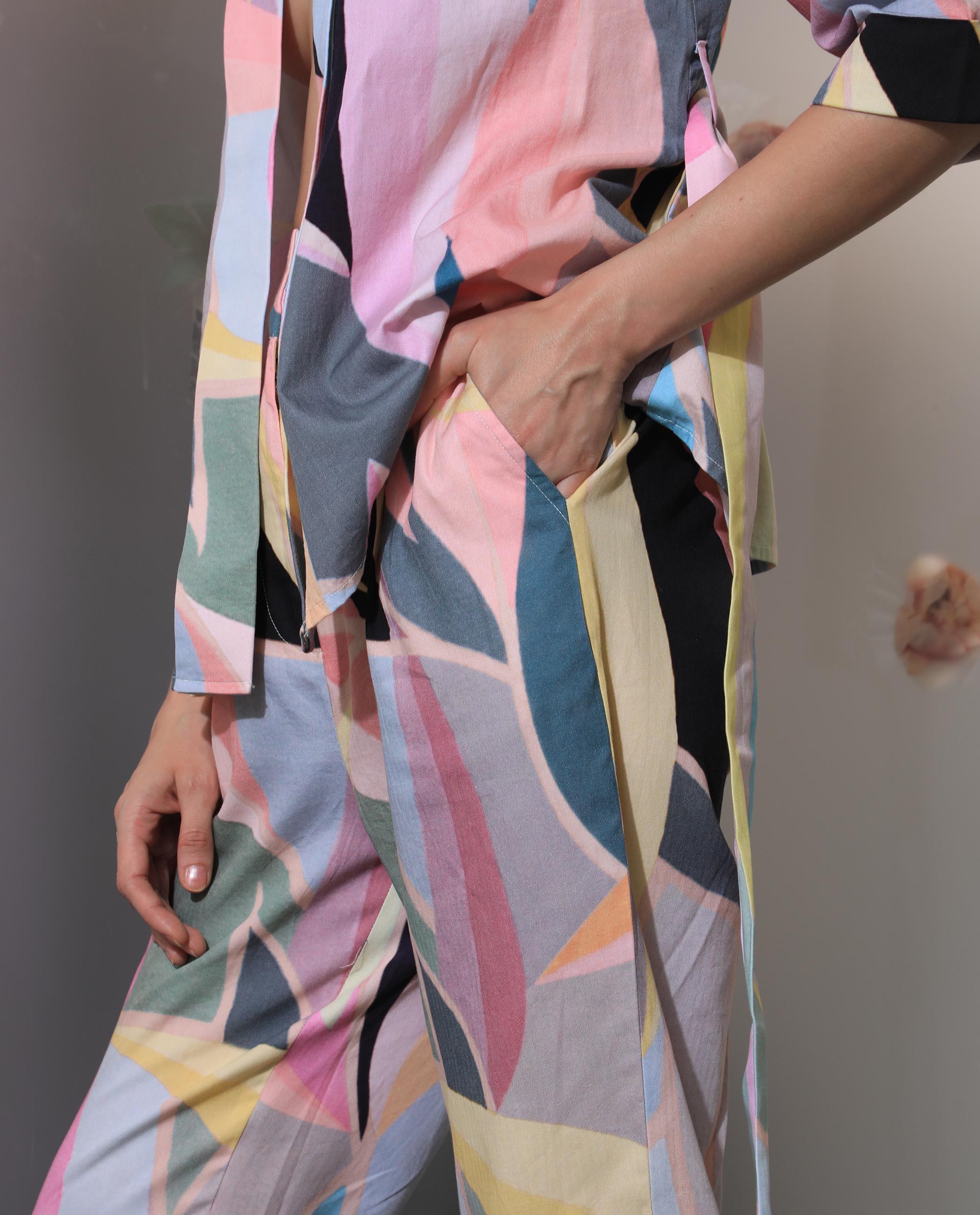 Rareism Women Nickle Pink Cotton Fabric Tailored Fit High Rise Abstract Print Ankle Length Trousers