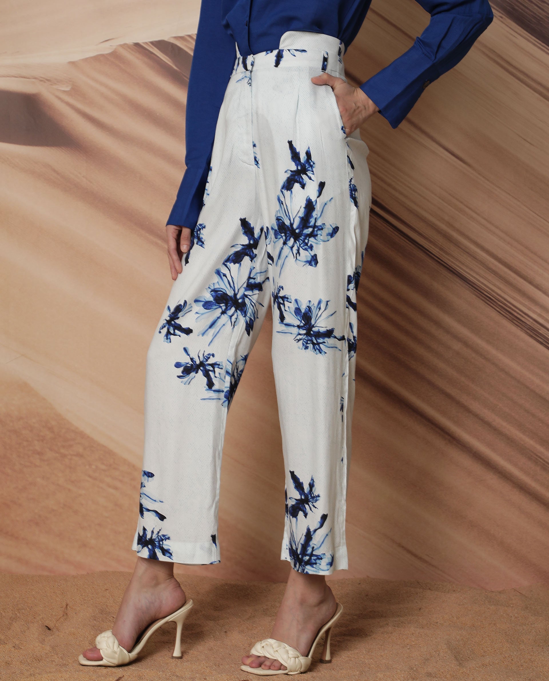 Rareism Women Irish White Poly Viscose Fabric Button Closure Regular Fit Floral Print Ankle Length Trousers