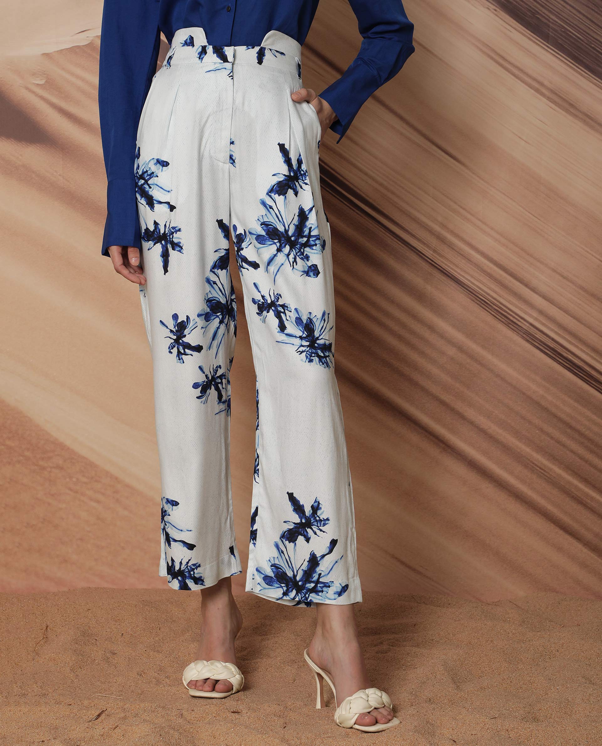 Rareism Women Irish White Poly Viscose Fabric Button Closure Regular Fit Floral Print Ankle Length Trousers