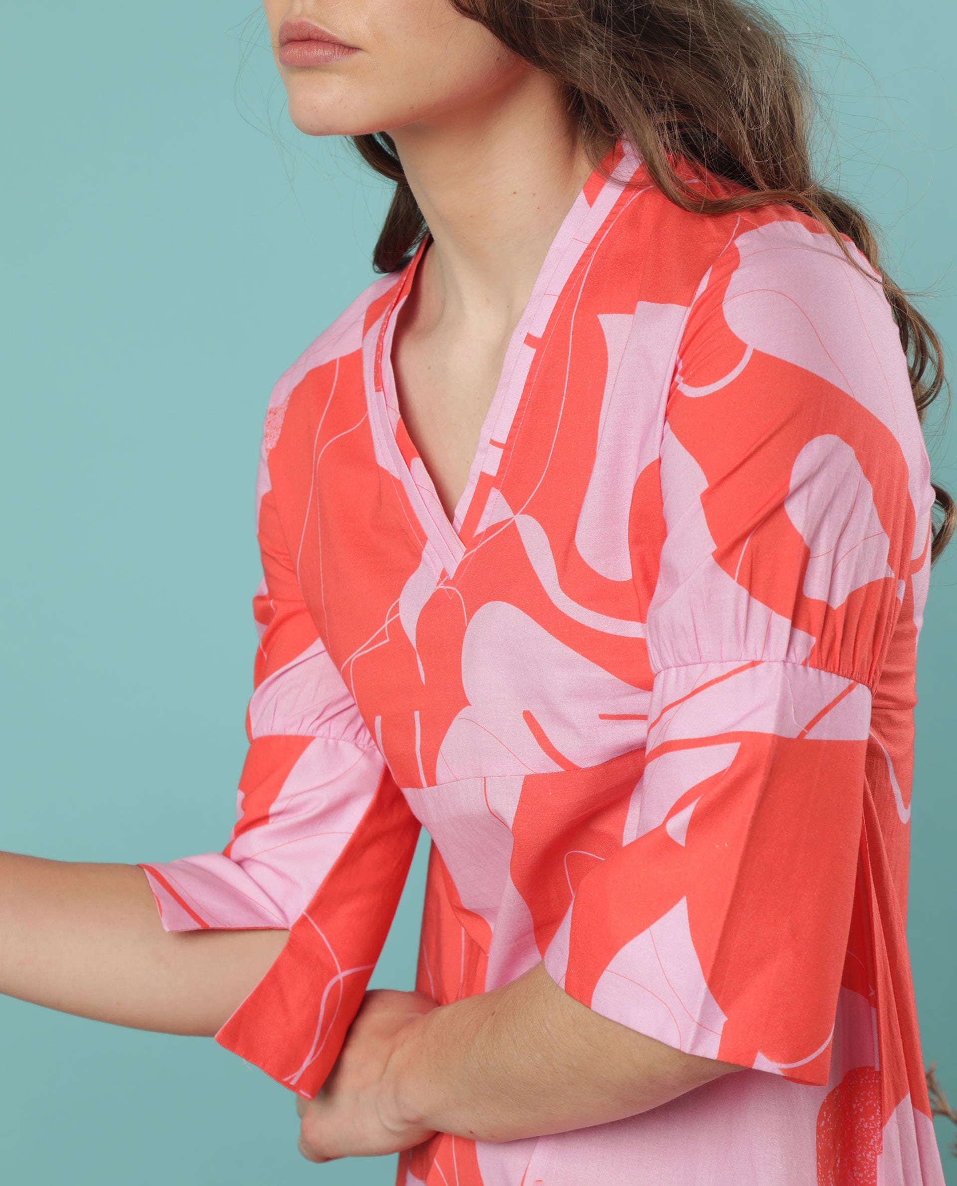 Rareism Women Daphne Orange Cotton Fabric 3/4Th Sleeves V-Neck Regular Fit Abstract Print Knee Length Asymmetric Dress