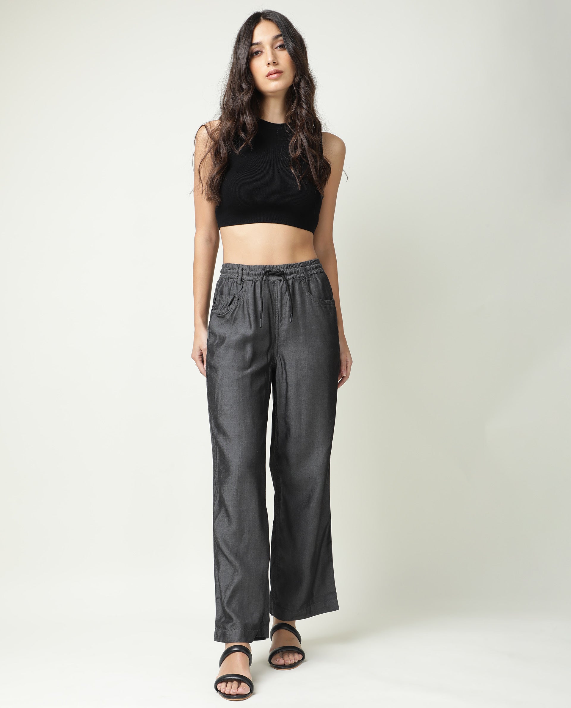 Rareism Women Lipo Black Tencel Fabric Solid Relaxed Fit Ankle Length High Rise Palazzo
