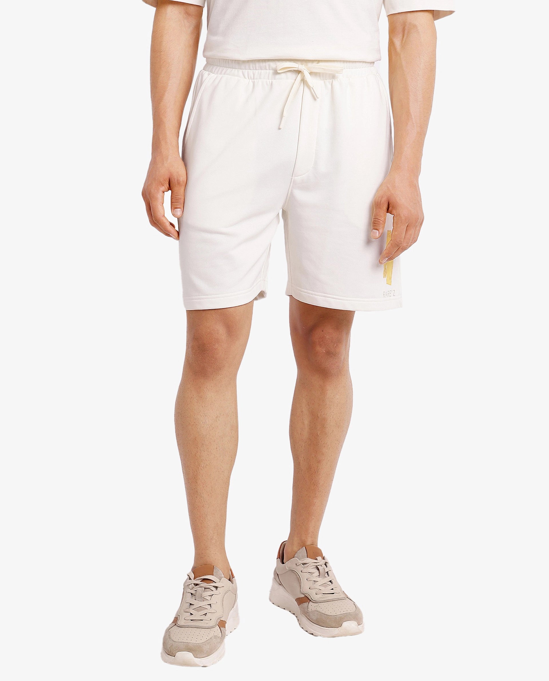 Rare Rabbit Men Jadez-B Off White Cotton Fabric Placement Print Drawstring Closure Oversized Fit Shorts