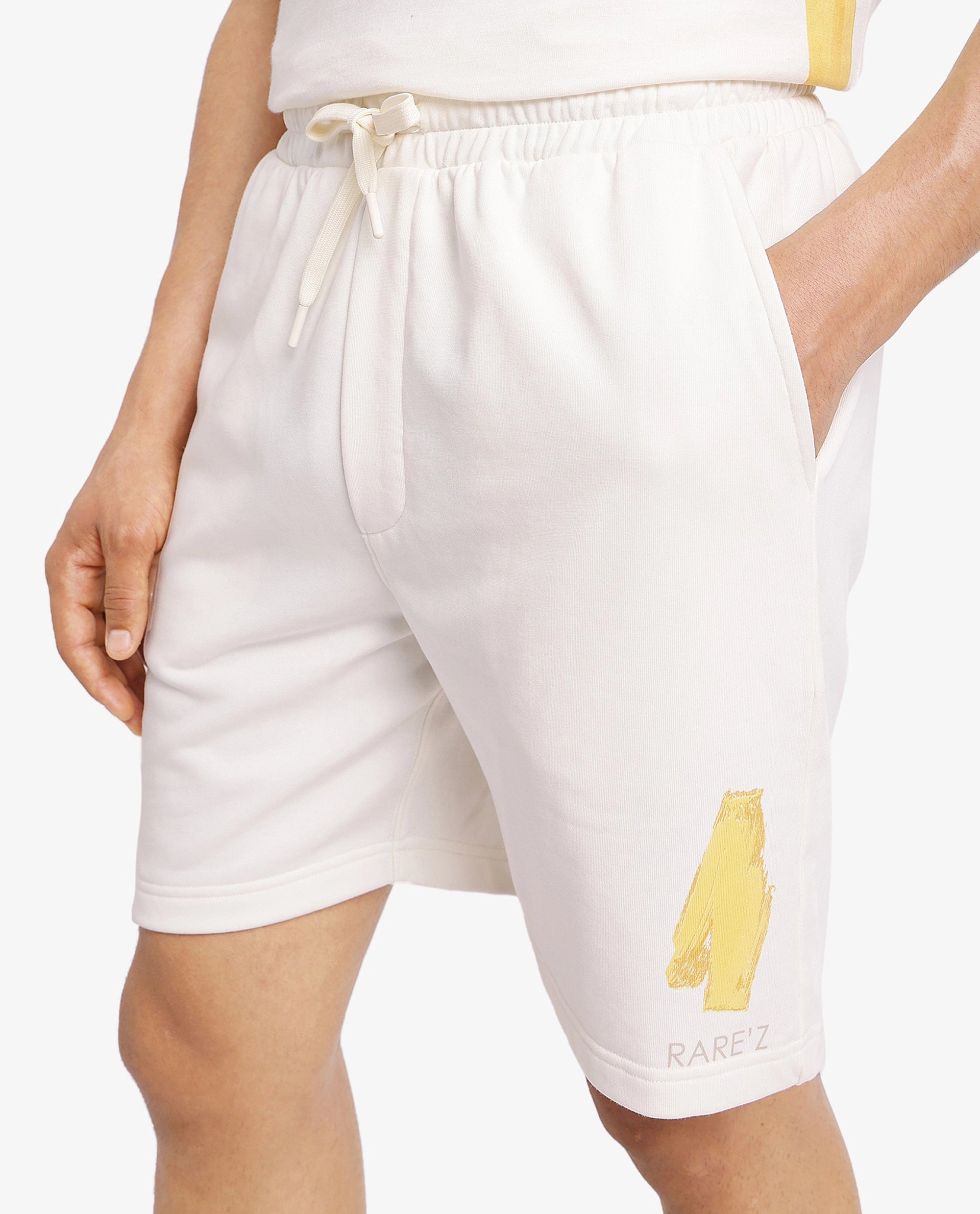 Rare Rabbit Men Jadez-B Off White Cotton Fabric Placement Print Drawstring Closure Oversized Fit Shorts