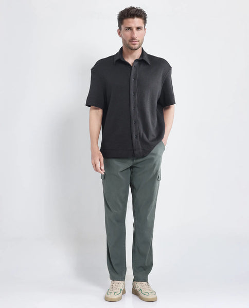 Rare Rabbit Men Kash Dark Green Viscose Fabric Half Sleeve Collared Neck Button Closure Oversized Fit Plain Shirt main image 0