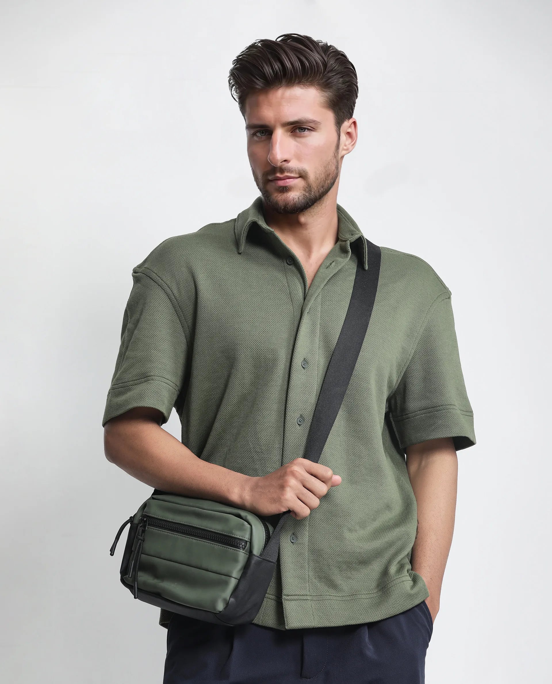 Rare Rabbit Men Kash Dark Green Viscose Fabric Half Sleeve Collared Neck Button Closure Oversized Fit Plain Shirt