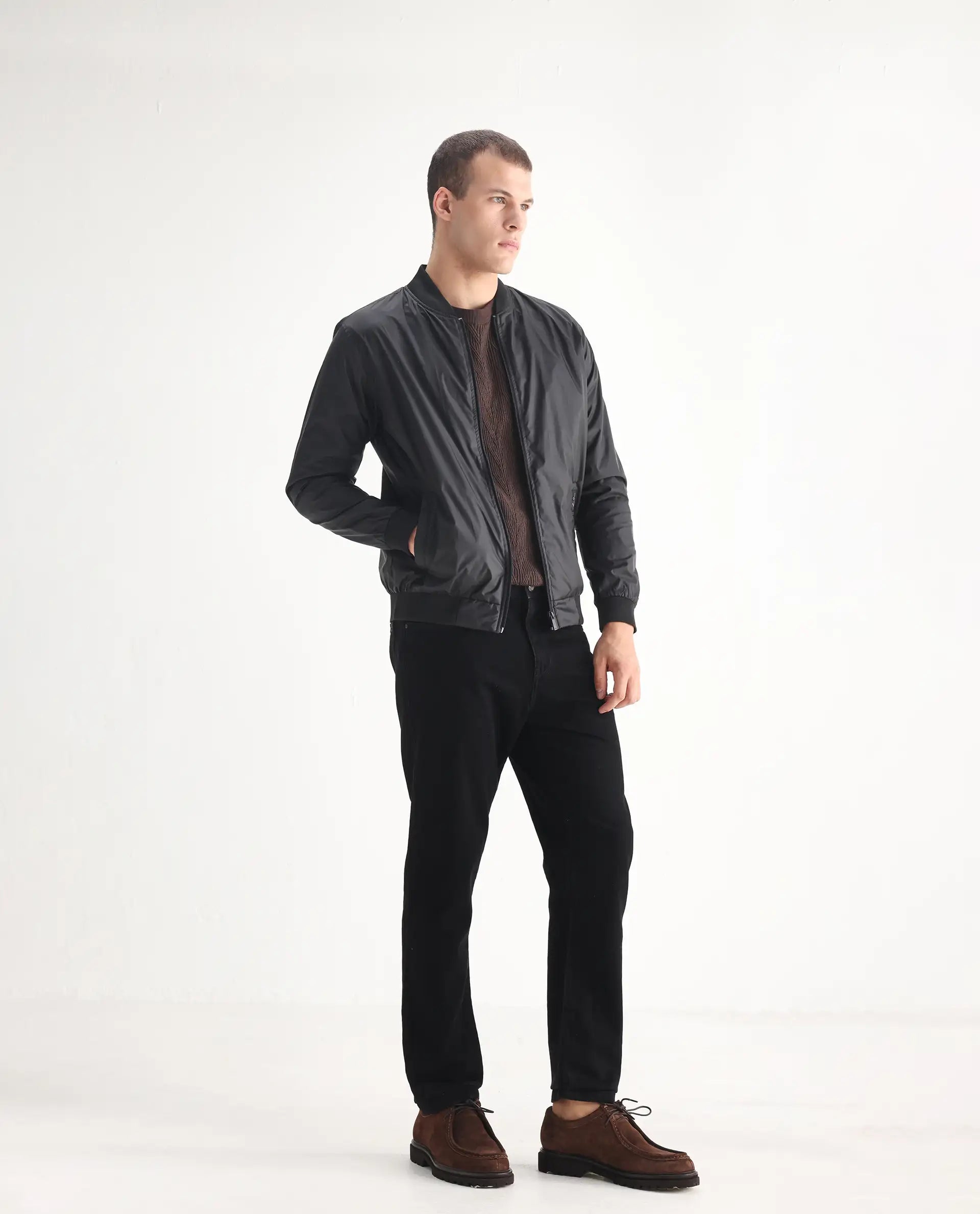 Rare Rabbit Men's Khal Black Cotton Plain Kurt Carrot Fit Jeans