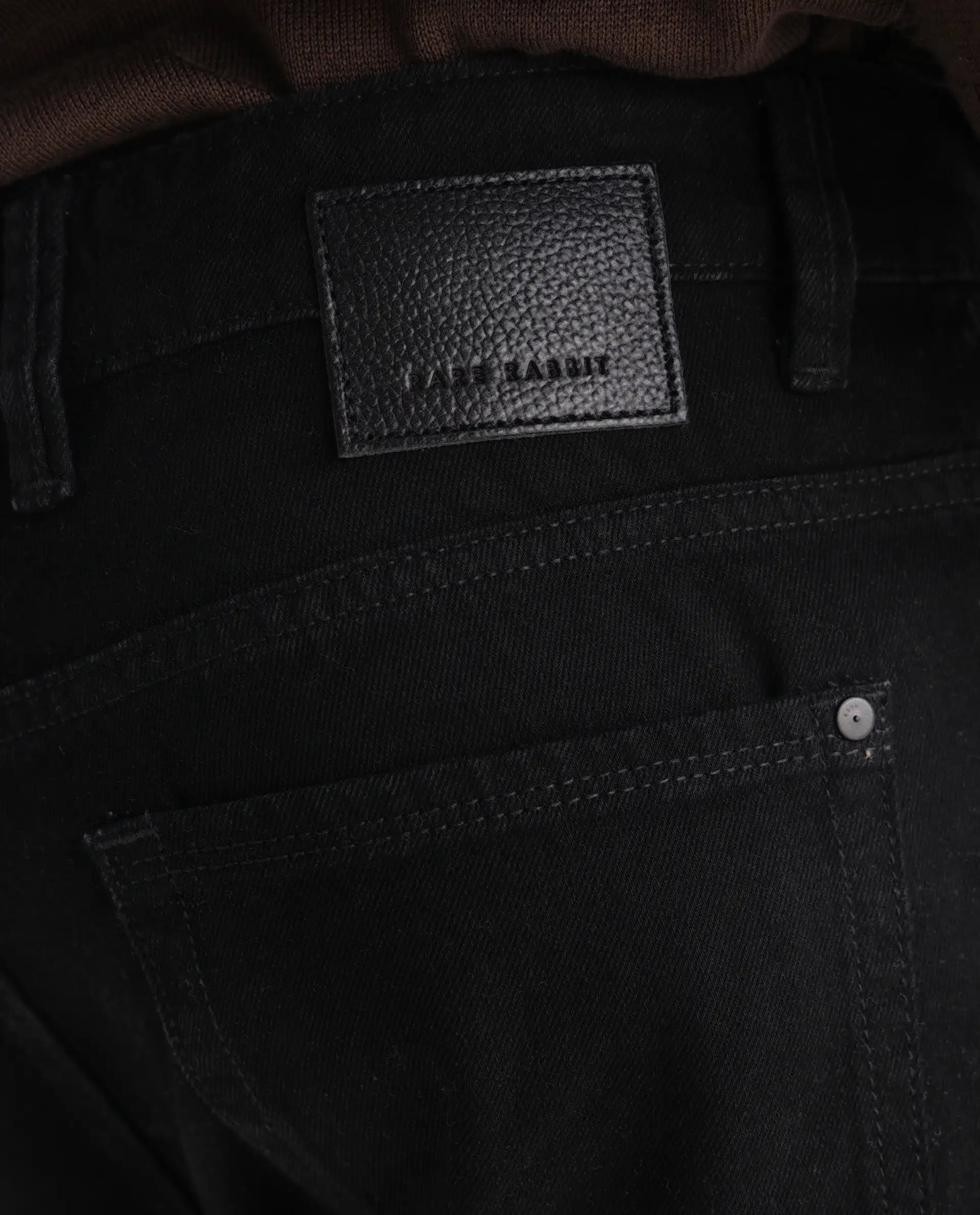 Rare Rabbit Men's Khal Black Cotton Plain Kurt Carrot Fit Jeans