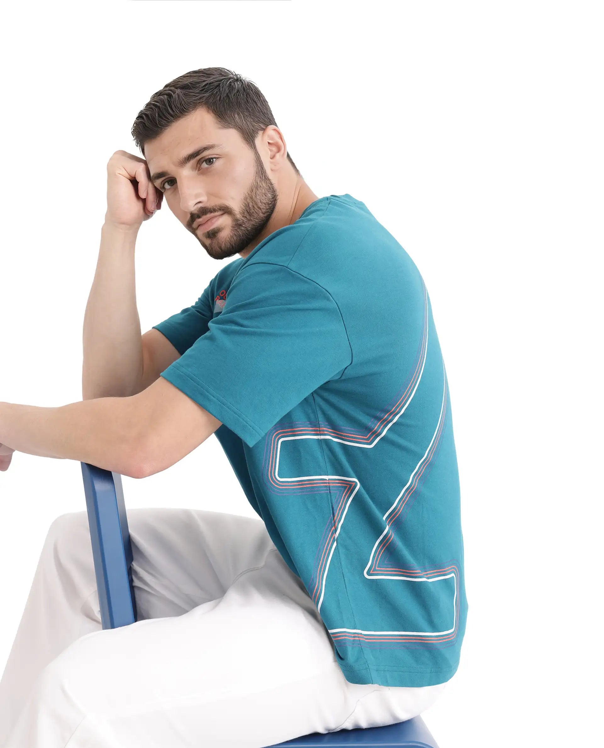 Rare Rabbit Men Klas Teal Cotton Fabric Short Sleeve Crew Neck Oversized Fit All Over Placement Backprint T-Shirt