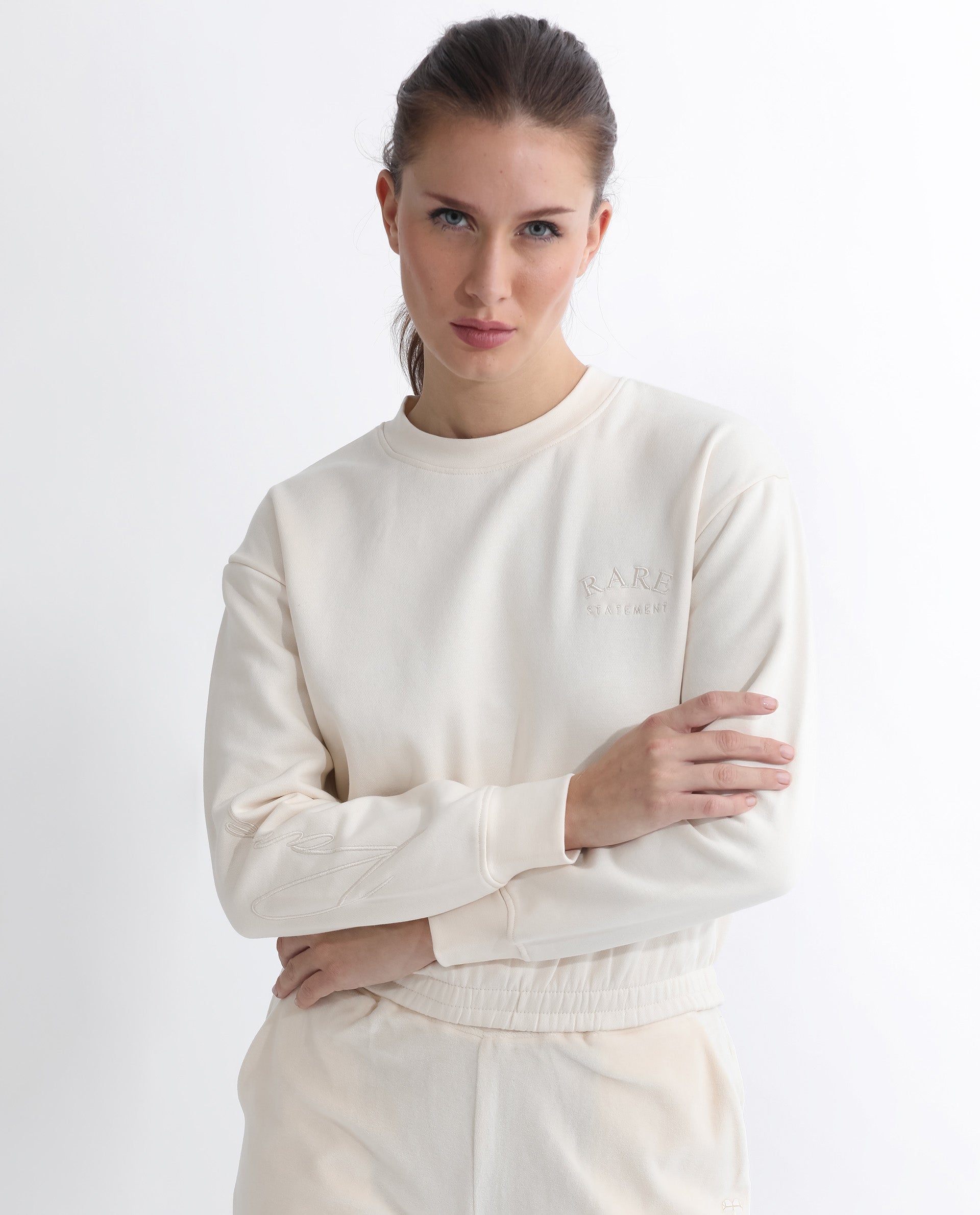 Rareism Articale Women Krok Beige Poly Cotton Fabric Full Sleeves Cuffed Sleeve Round Neck Regular Fit Plain Cropped Sweatshirt