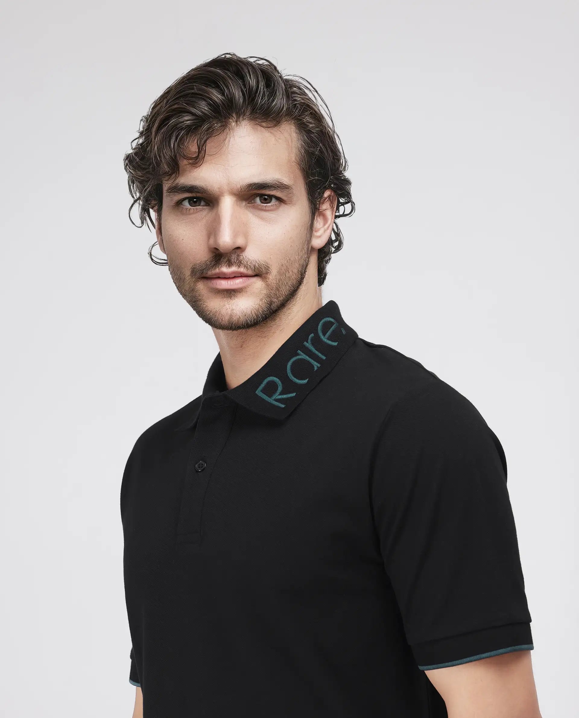 Rare Rabbit Men's Limo Black Cotton Blend Fabric Short Sleeve Collared Neck Button Closure Plain Polo