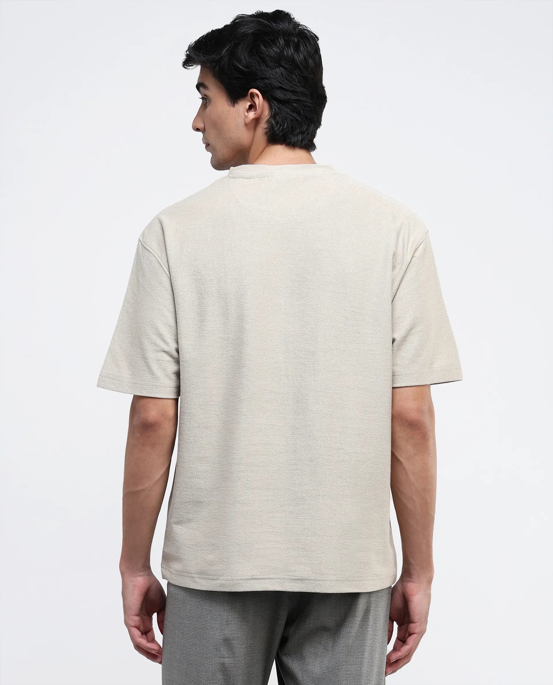 Rare Rabbit Men Loopet-1 Beige Cotton Lycra Fabric Half Sleeves Floral Print Pocket Detailing Oversized Fit Solid T-Shirt