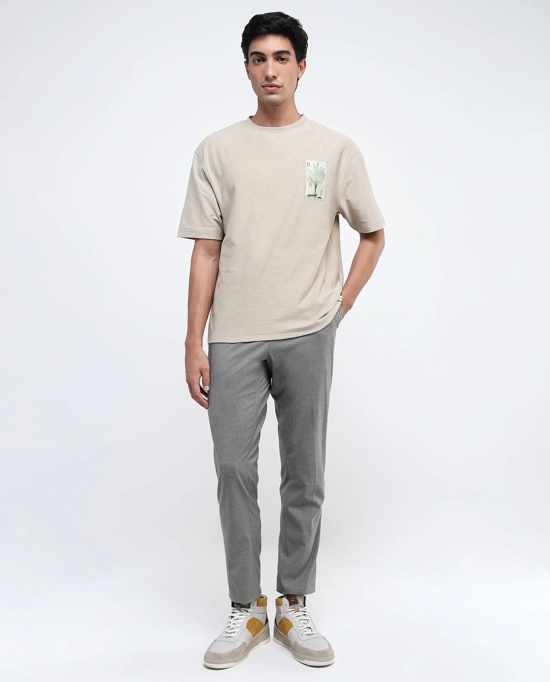 Rare Rabbit Men Loopet-1 Beige Cotton Lycra Fabric Half Sleeves Floral Print Pocket Detailing Oversized Fit Solid T-Shirt