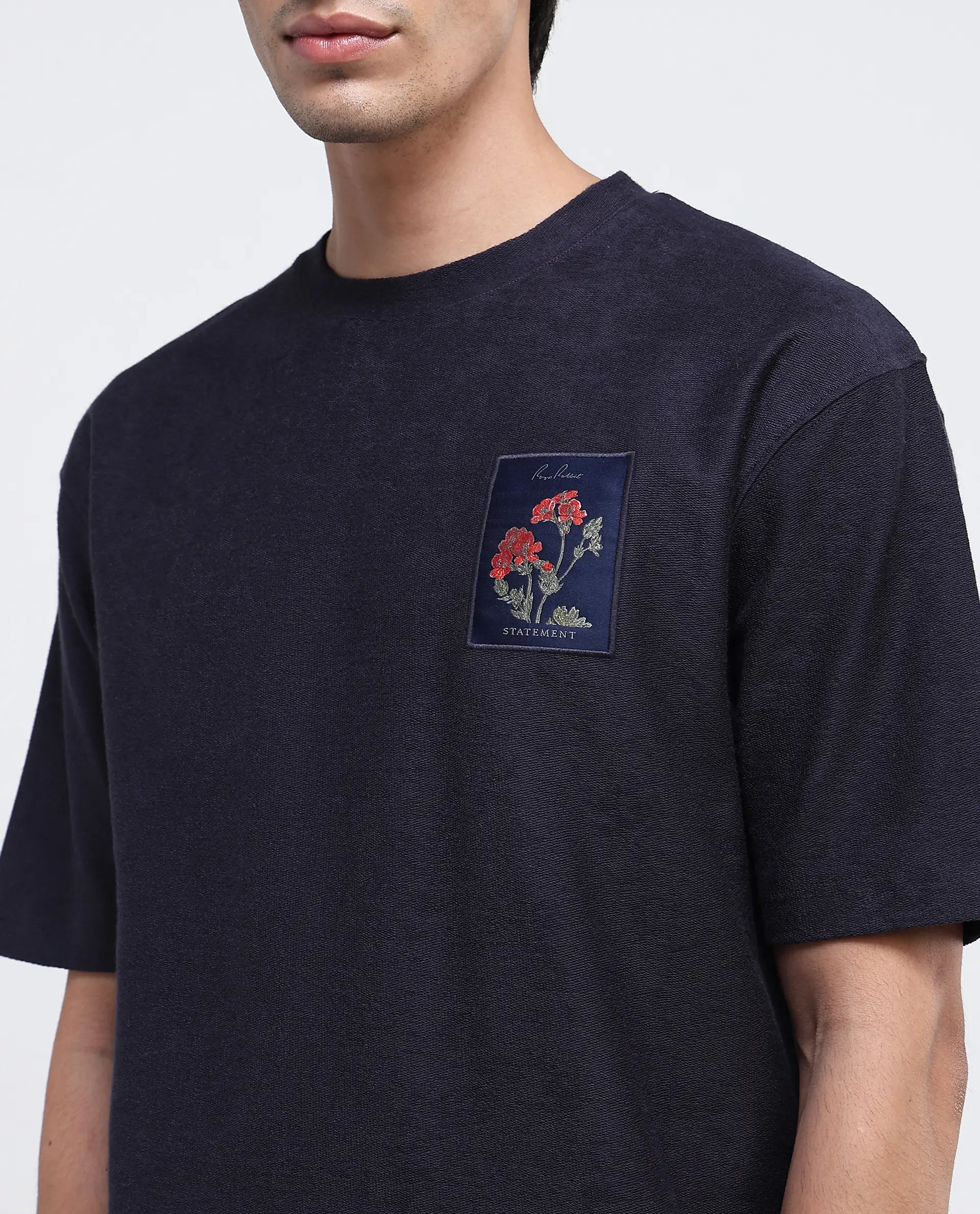 Rare Rabbit Men Loopet-1 Navy Cotton Lycra Fabric Half Sleeves Floral Print Pocket Detailing Oversized Fit Solid T-Shirt