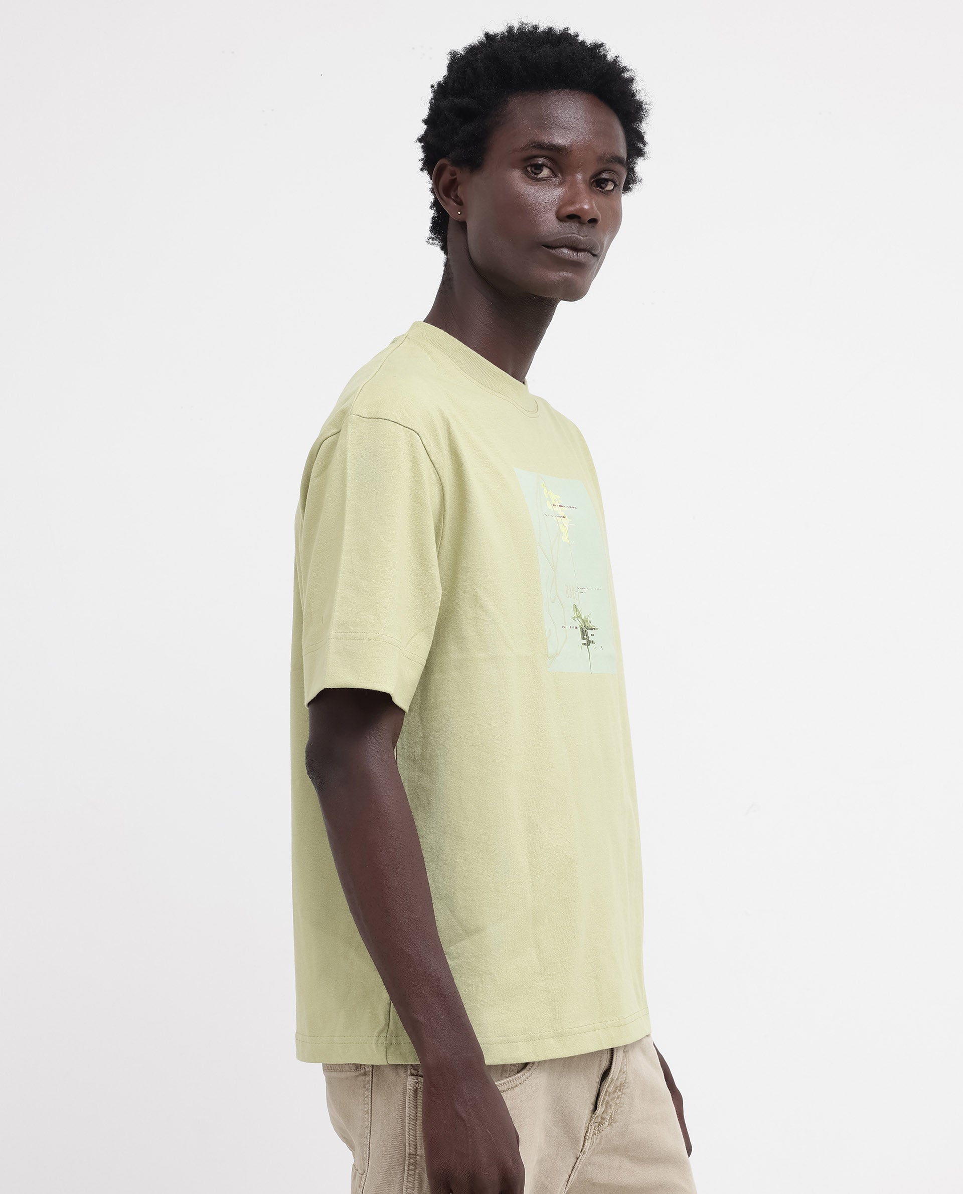Rare Rabbit Articale Mens Luca Light Green Cotton Polyester Fabric Short Sleeve Crew Neck Oversized Fit Graphic Printed T-Shirt
