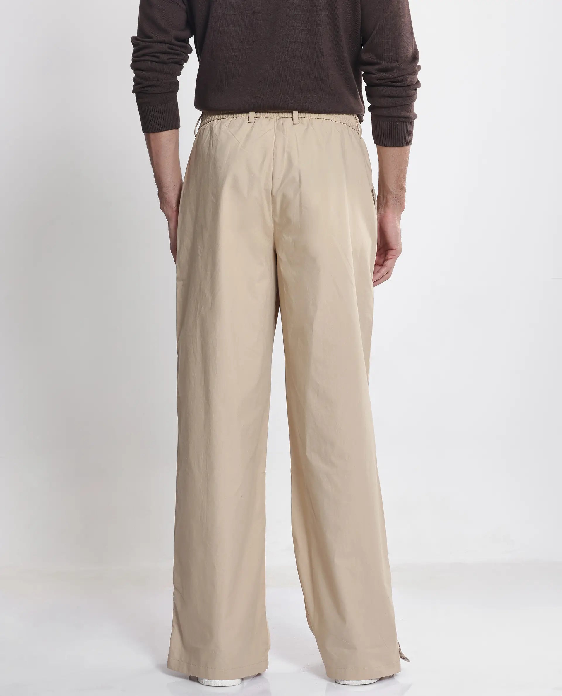 Rare Rabbit Men Macon Beige Cotton Fabric Tape Detailed Mid Rise Baggy Fit Track Pant