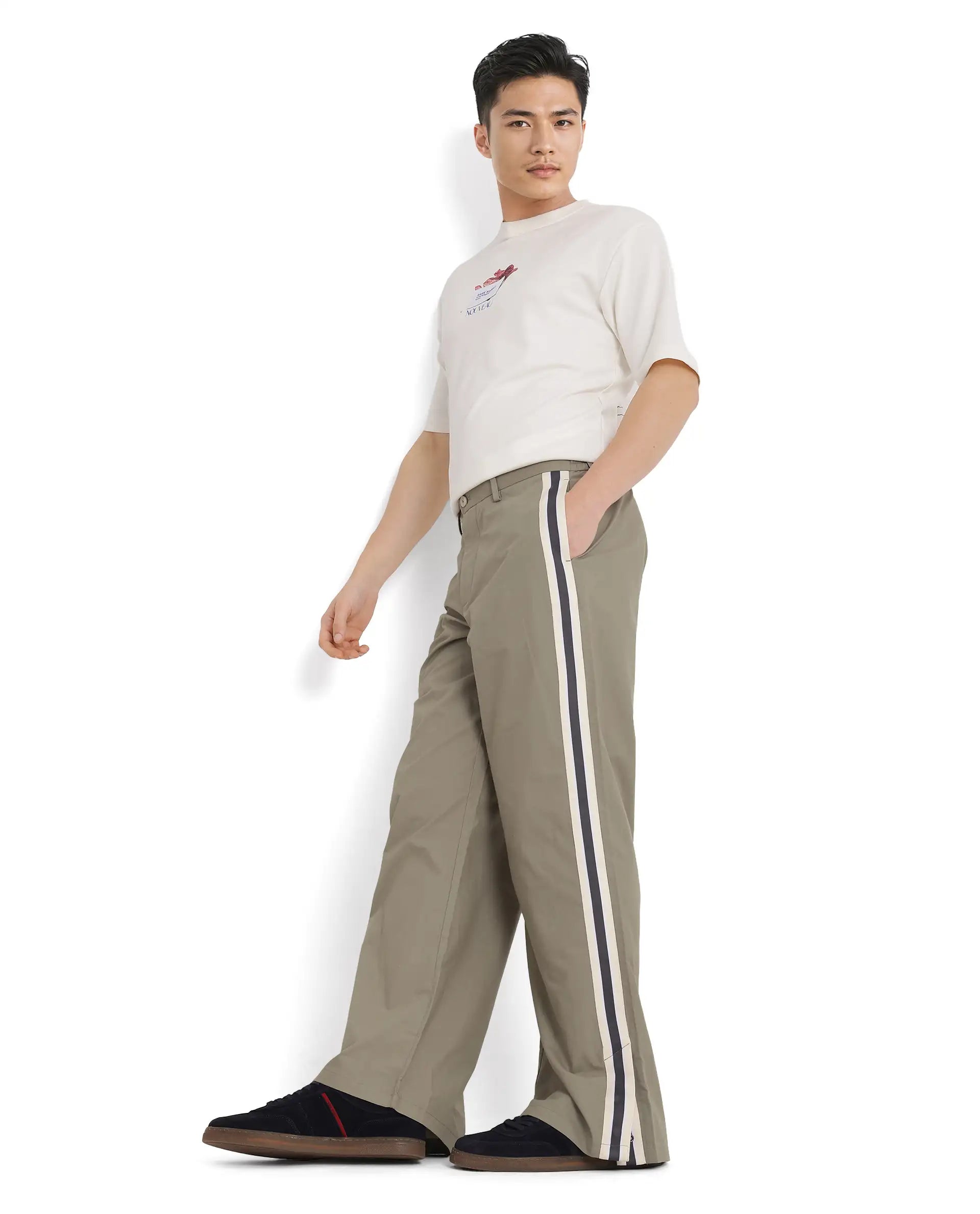 Rare Rabbit Men Macon Green Cotton Fabric Mid Rise Baggy Fit Side Slit with Snap Button Closure Tape Detailing Track Pant