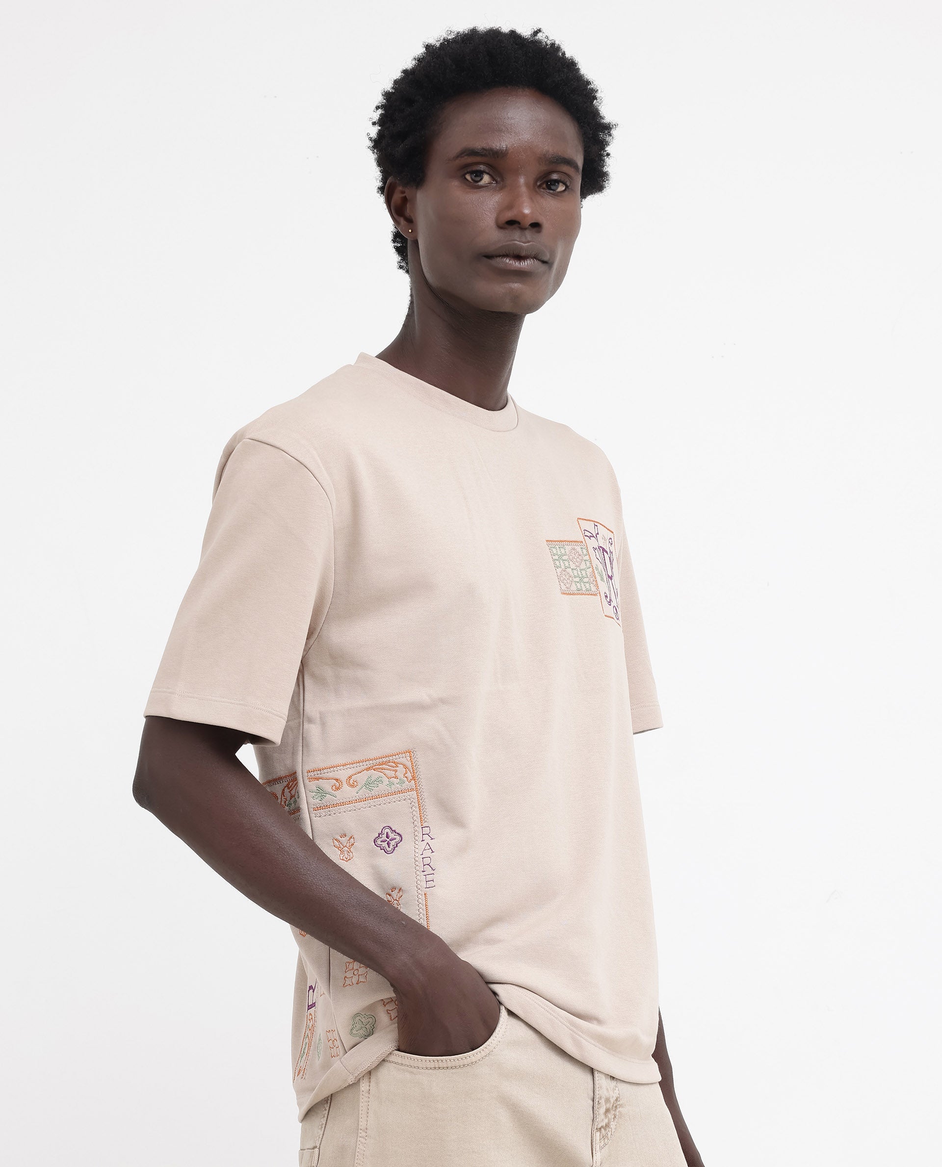 Rare Rabbit Mens Myro Beige Cotton Polyester Fabric Oversized Fit Embroidered T-Shirt