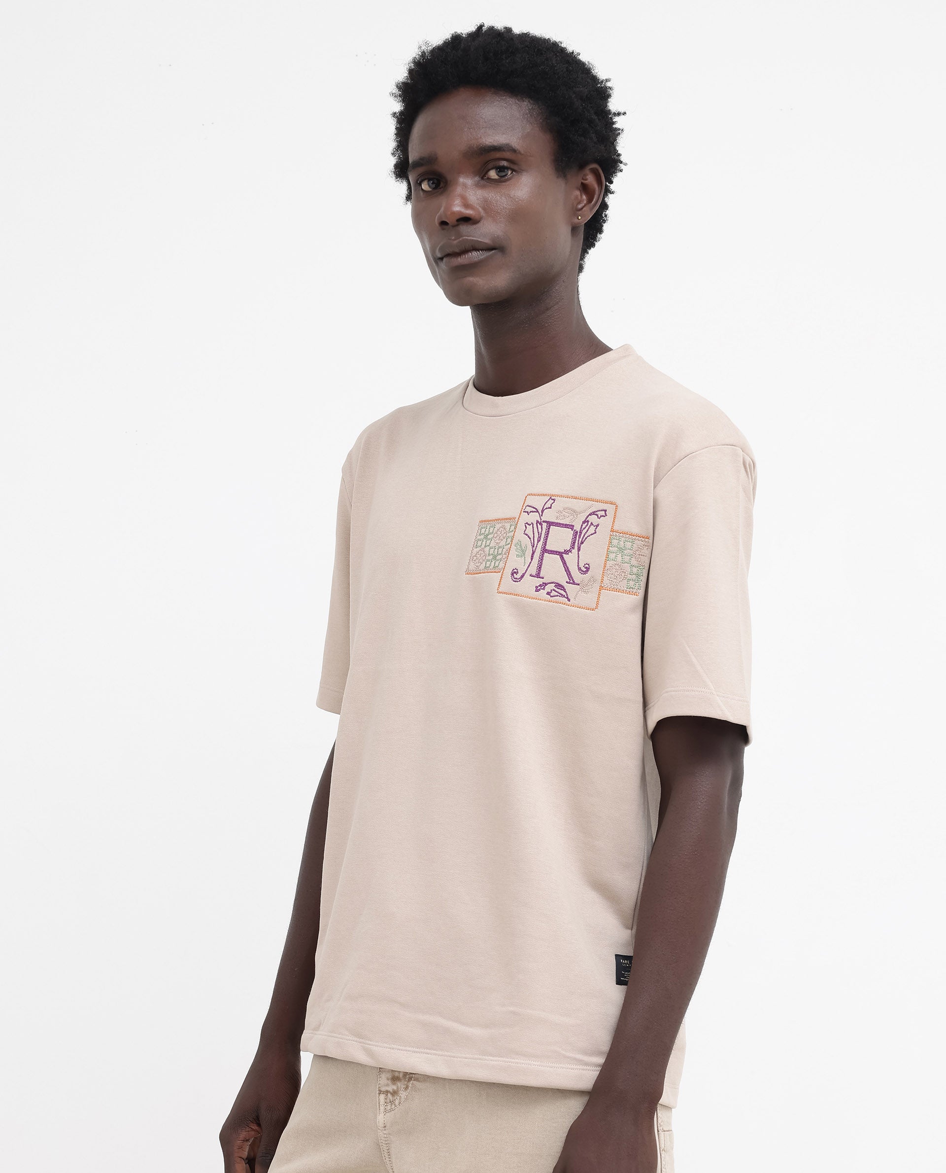 Rare Rabbit Mens Myro Beige Cotton Polyester Fabric Oversized Fit Embroidered T-Shirt