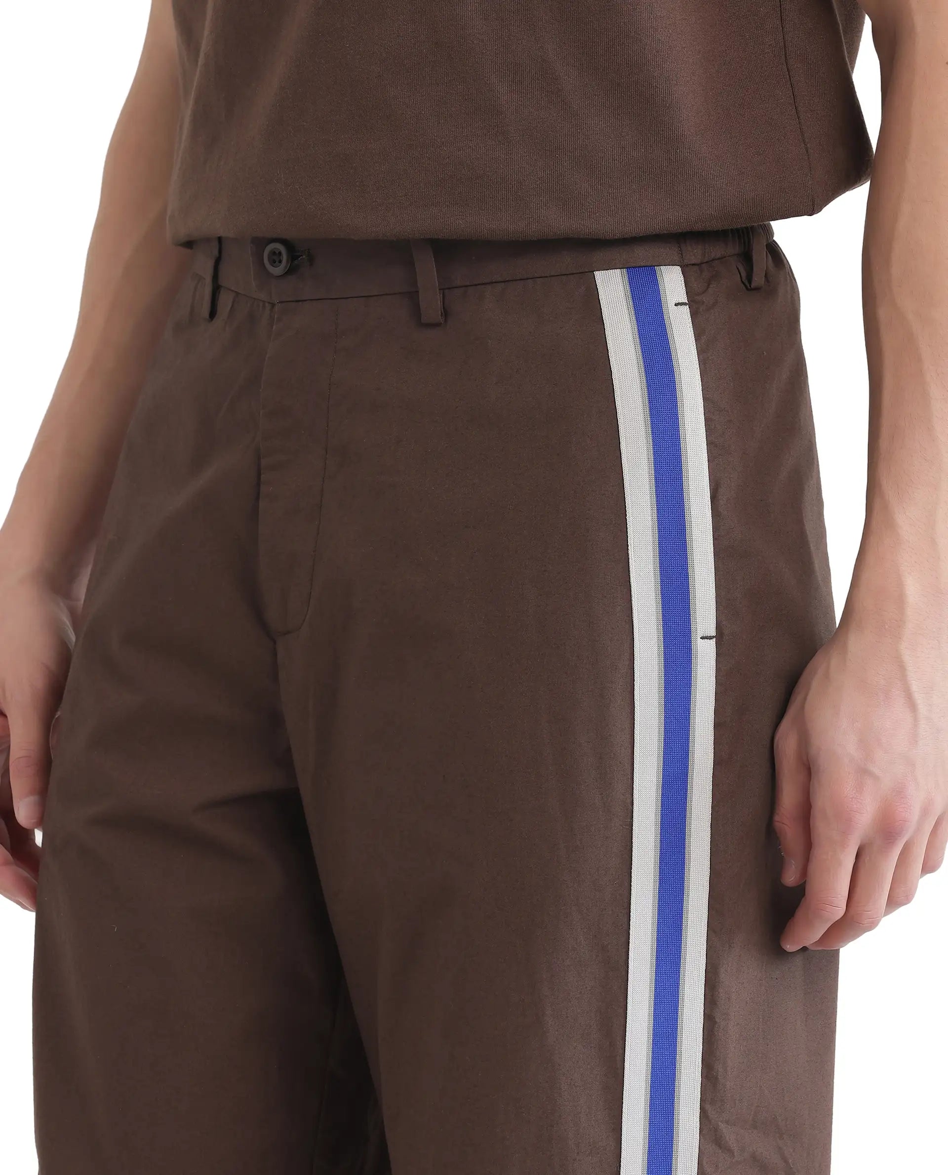 Rare Rabbit Men Newnon Brown Cotton Fabric Mid Rise Baggy Fit Side Slit with Snap Button Closure Tape Detailing Track Pant