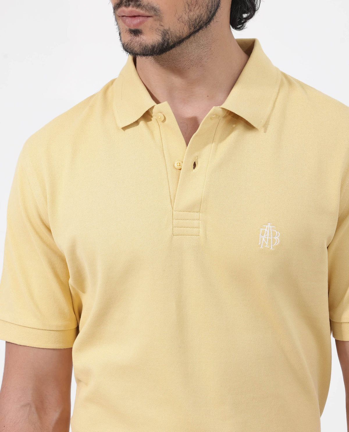 Rare Rabbit Mens Paret-Bright Yellow Short Sleeve Embroidered Logo Solid Polo T-Shirt