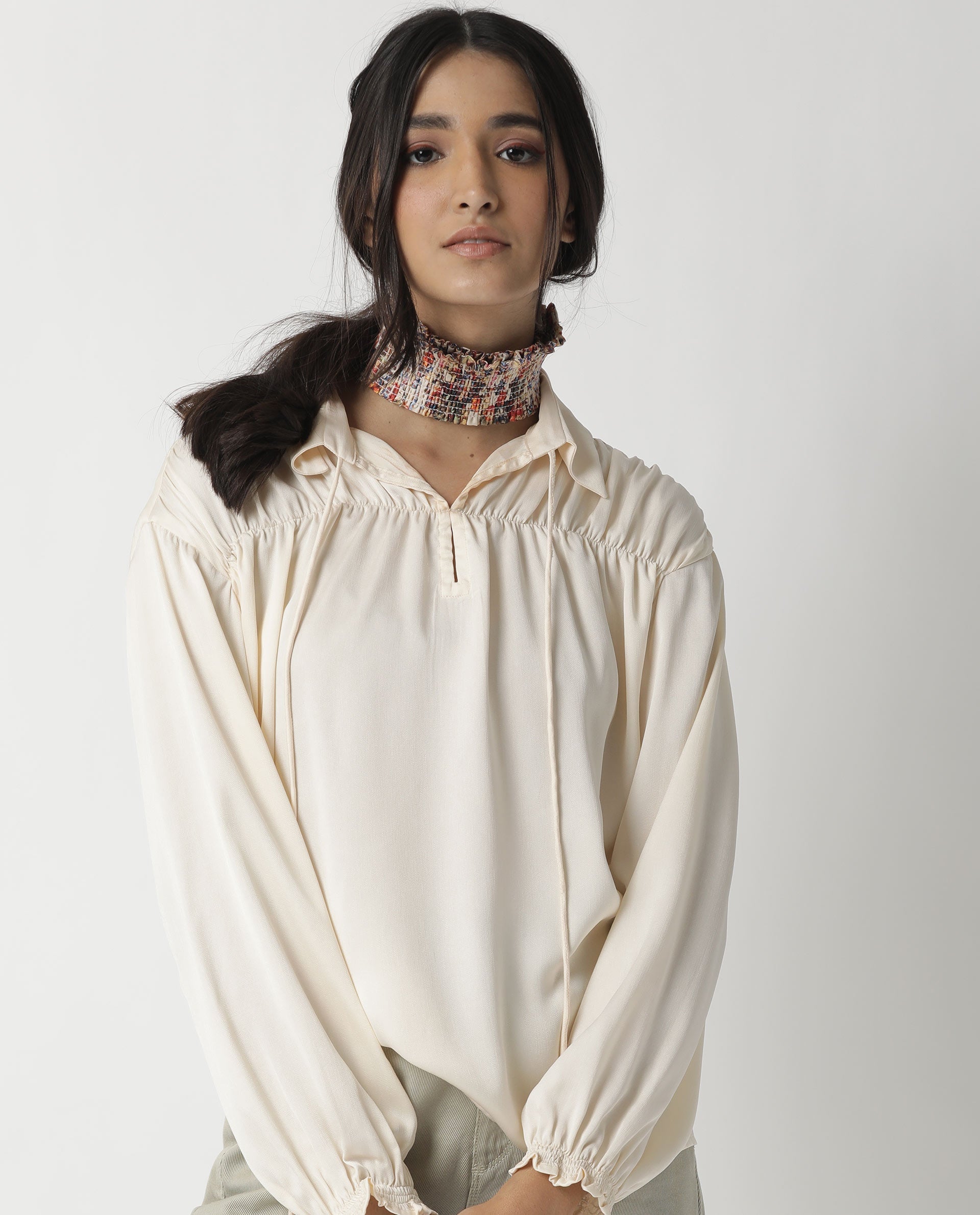 Rareism Women Paxo Off White Poly Cotton Fabric Regular Fit Tie-Up Neck Full Sleeves Solid Top