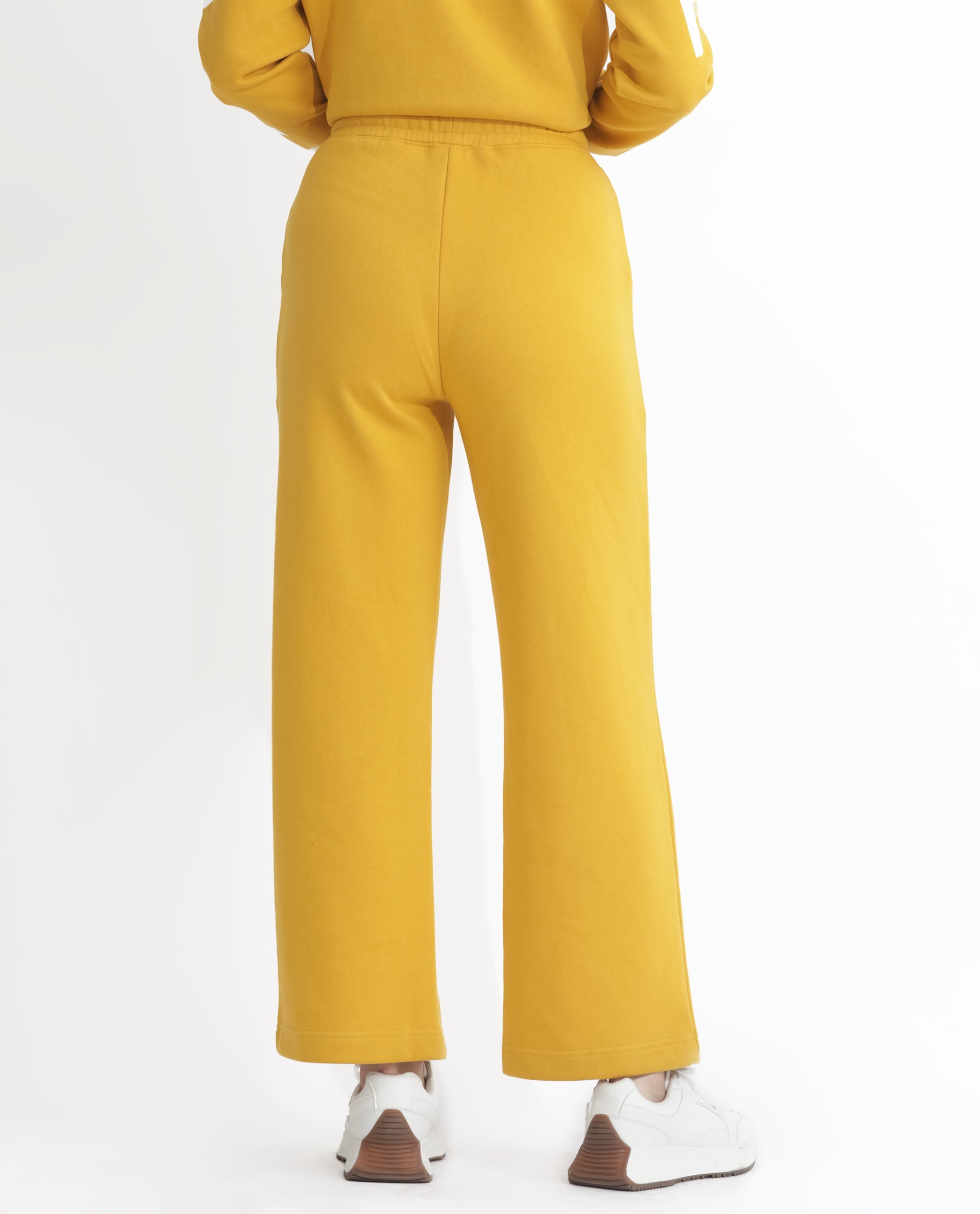 Rareism Women Pazoo F Mustard Cotton Blend Fabric Flared Solid Mid Rise Ankle Length Track Pant