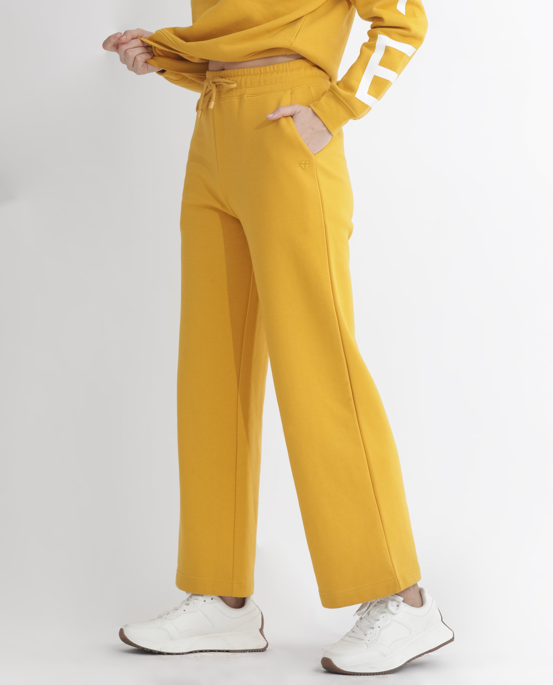 Rareism Women Pazoo F Mustard Cotton Blend Fabric Flared Solid Mid Rise Ankle Length Track Pant