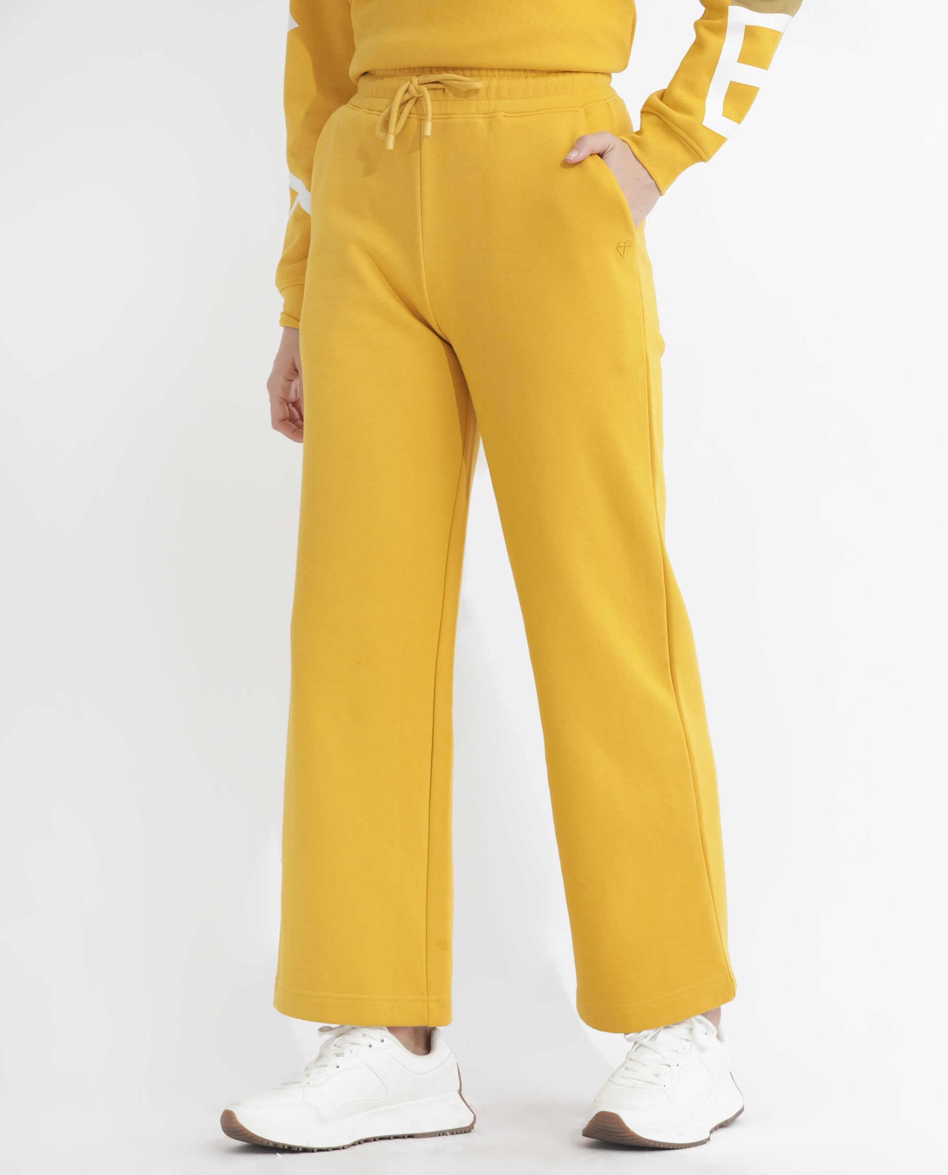 Rareism Women Pazoo F Mustard Cotton Blend Fabric Flared Solid Mid Rise Ankle Length Track Pant