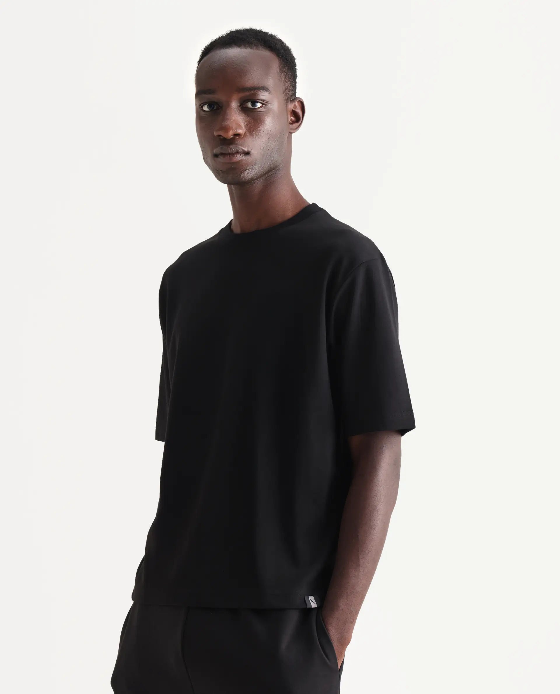 Rare Rabbit Men's Qlo Black Cotton Blend Plain Oversized Fit Half Sleeve Crew Neck T-Shirt