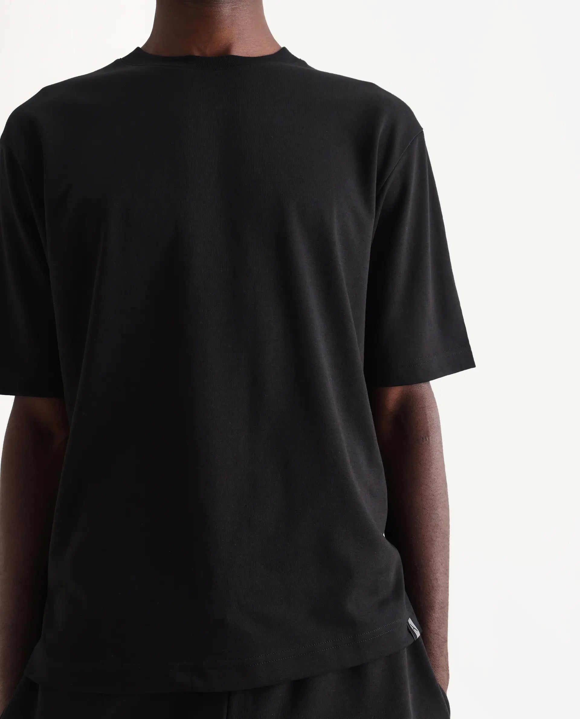 Rare Rabbit Men's Qlo Black Cotton Blend Plain Oversized Fit Half Sleeve Crew Neck T-Shirt