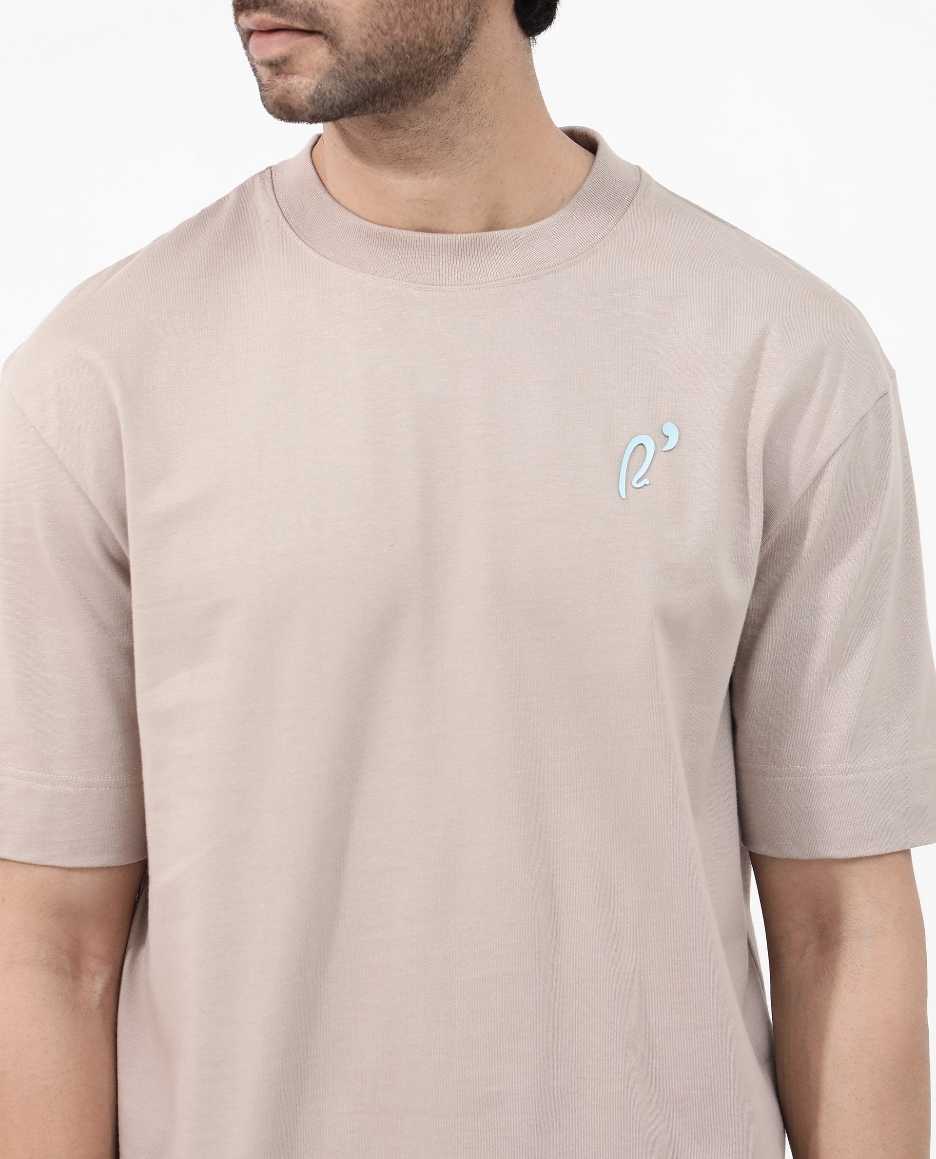 Rare Rabbit Articale Mens Quade Beige Cotton Polyester Fabric Short Sleeve Crew Neck Oversized Fit Graphic Printed T-Shirt