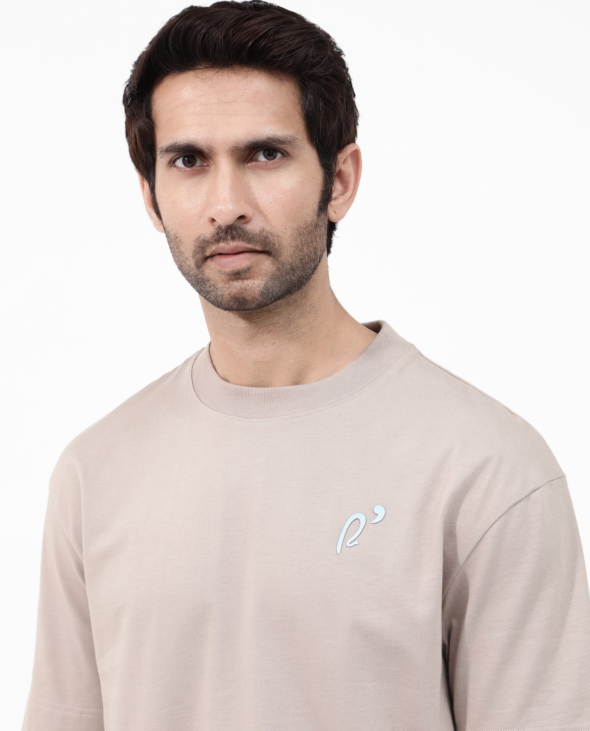 Rare Rabbit Articale Mens Quade Beige Cotton Polyester Fabric Short Sleeve Crew Neck Oversized Fit Graphic Printed T-Shirt