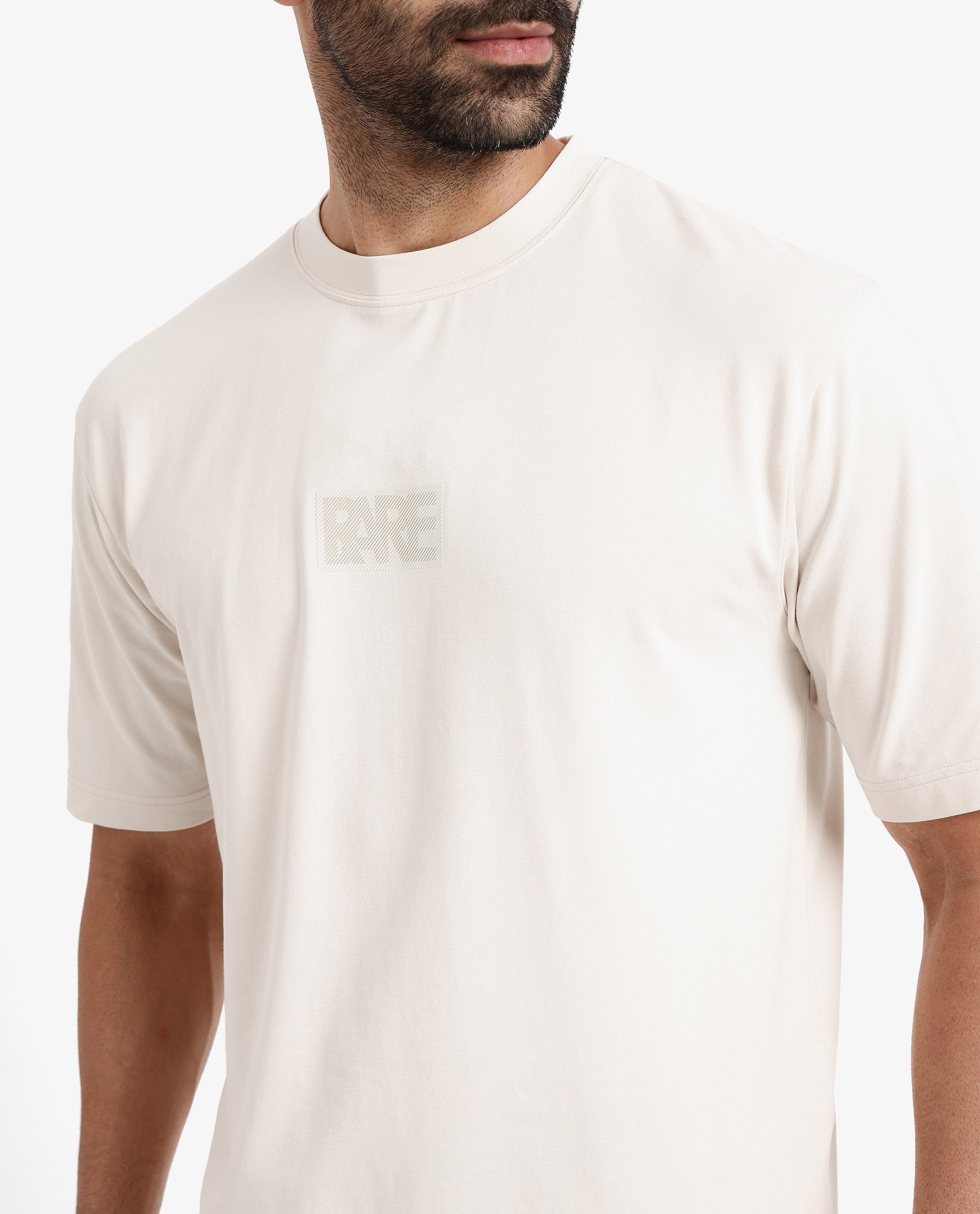 Rare Rabbit Men Reborn-T Beige Cotton Fabric Short Sleeve Crew Neck Oversized Fit Graphic Print T-Shirt