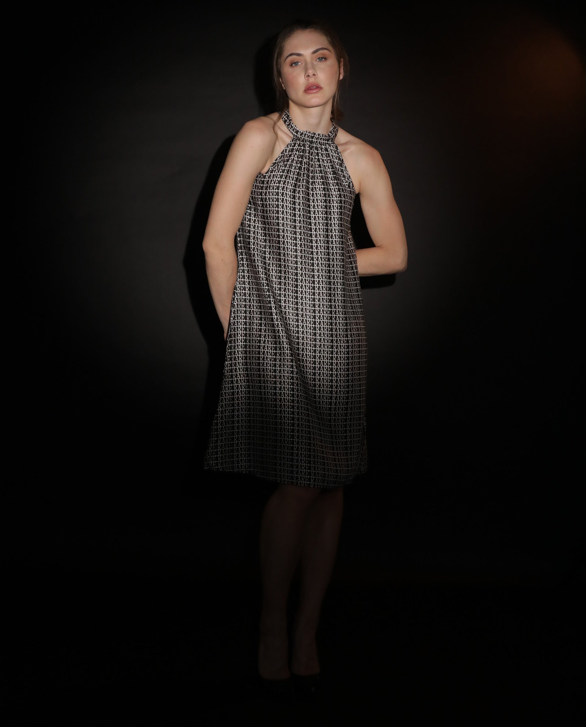 Rareism Women Renata Black Halter Neck With Tie Up Back And Pockets Knee Length Dress