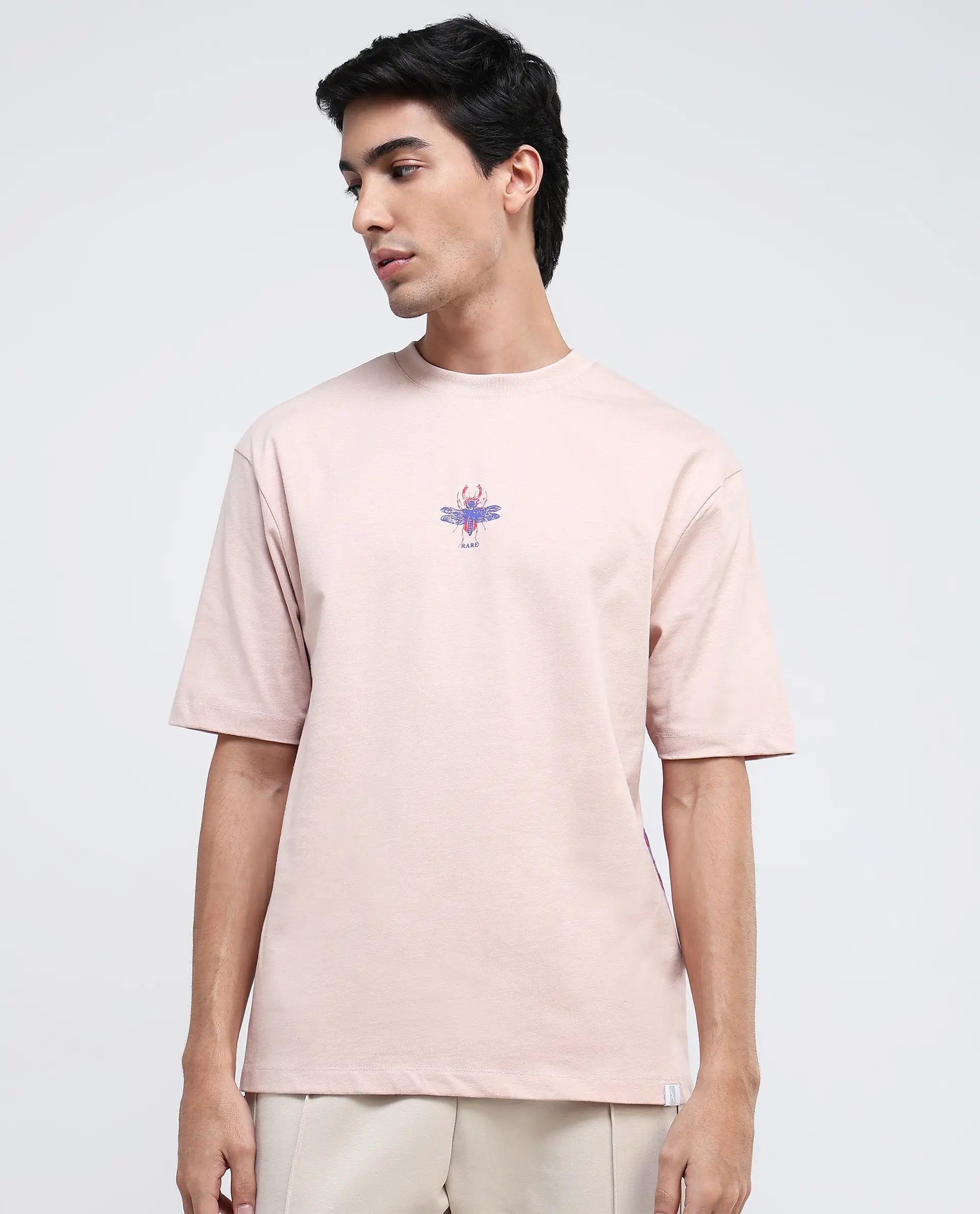 Rare Rabbit Men Rigy Pastel Pink Short Sleeve Crew Neck Oversized Fit Graphic Back Print T-Shirt