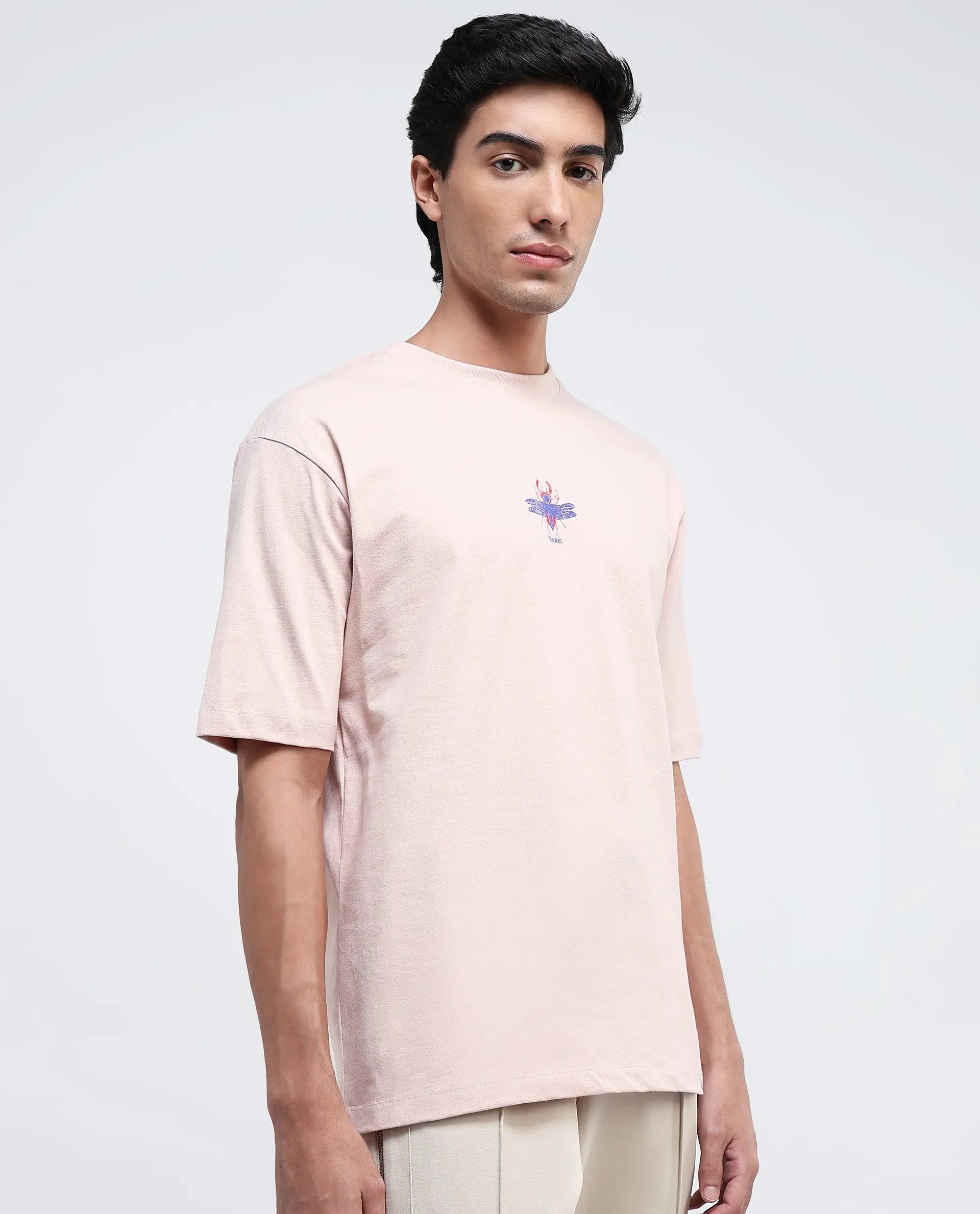 Rare Rabbit Men Rigy Pastel Pink Short Sleeve Crew Neck Oversized Fit Graphic Back Print T-Shirt
